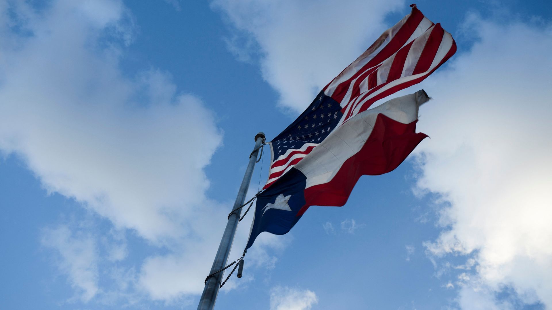 american and texas flags