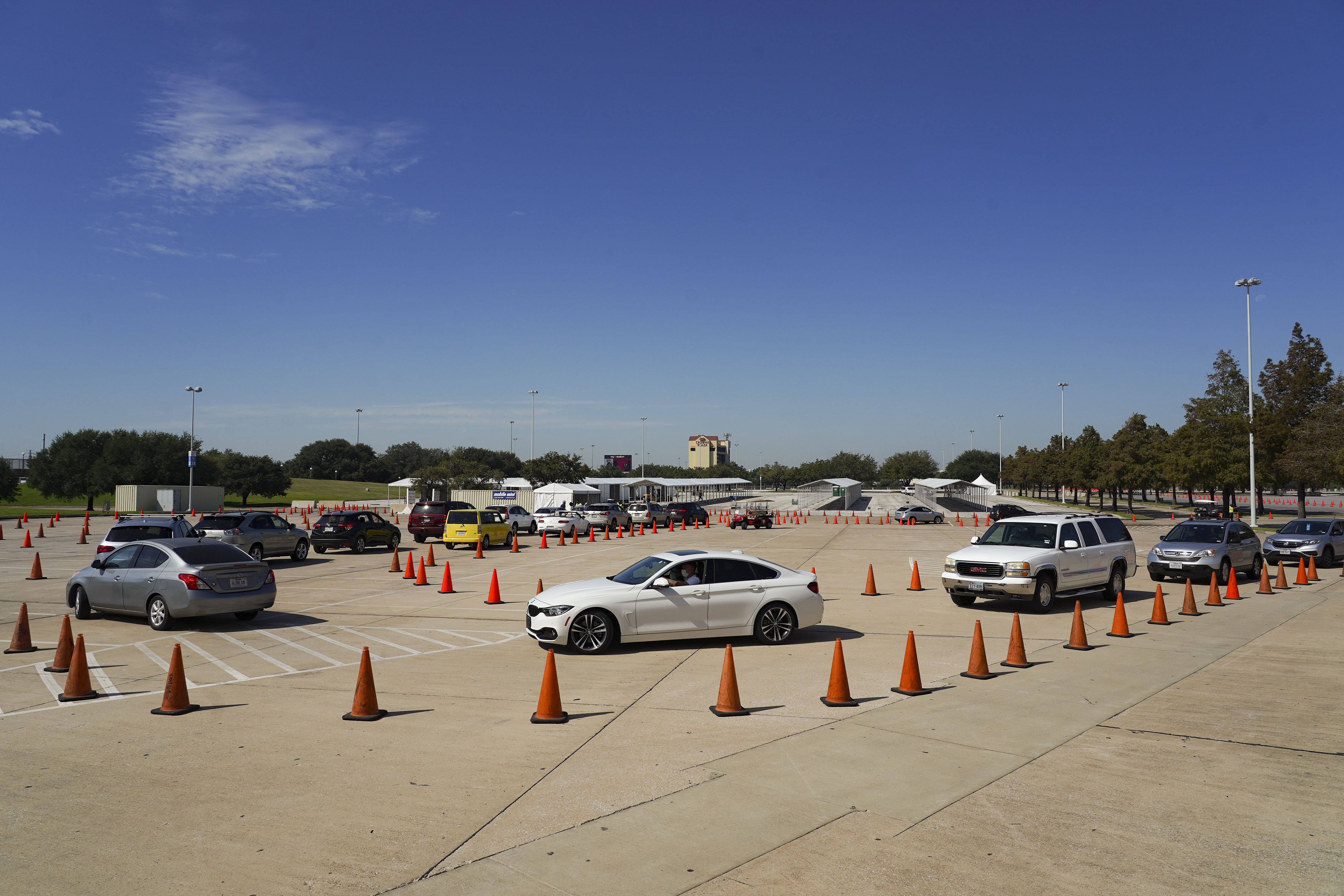 Cars lined up at a polling place.
