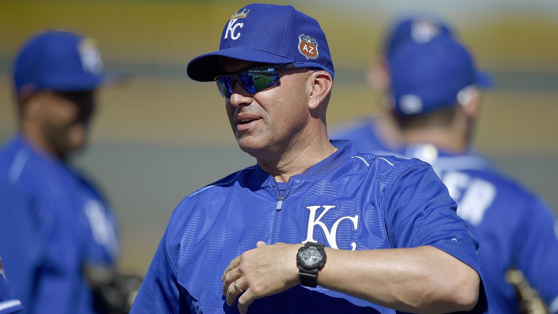 Photo of baseball manager on field.