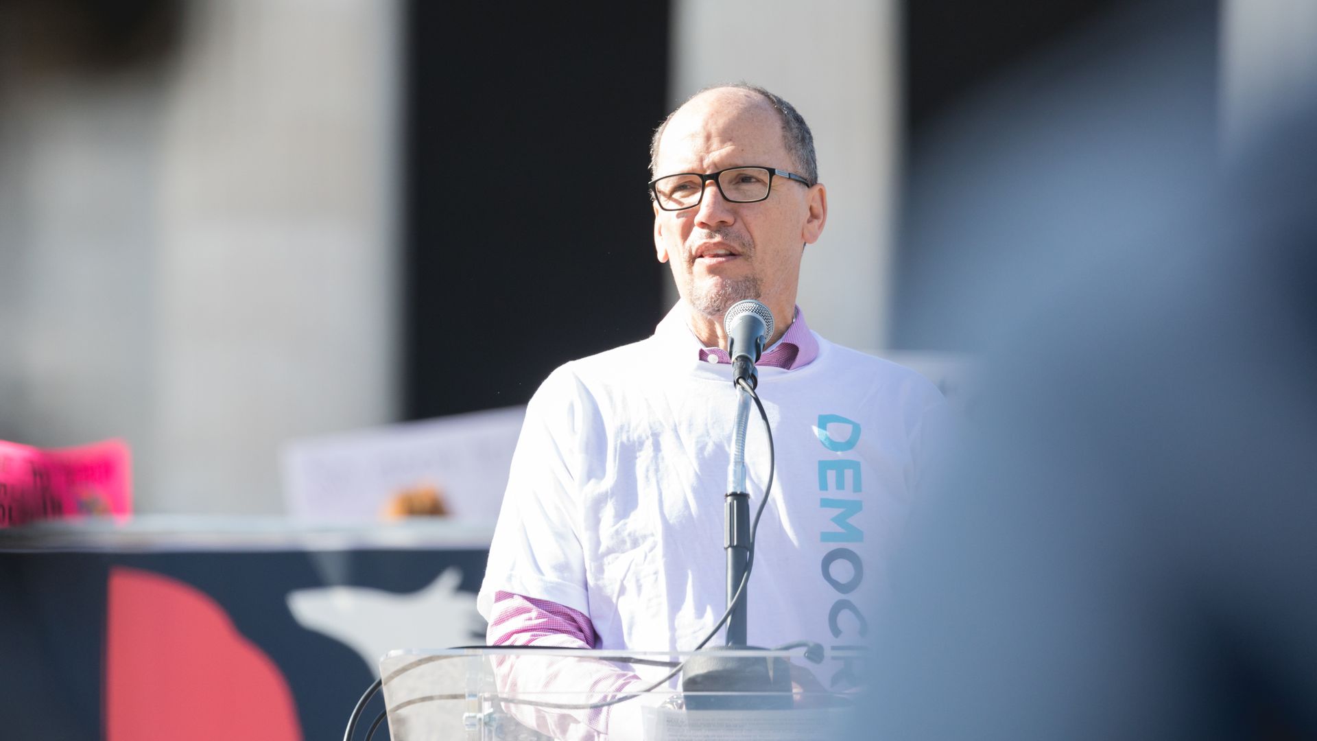 Tom Perez speaks at a microphone.