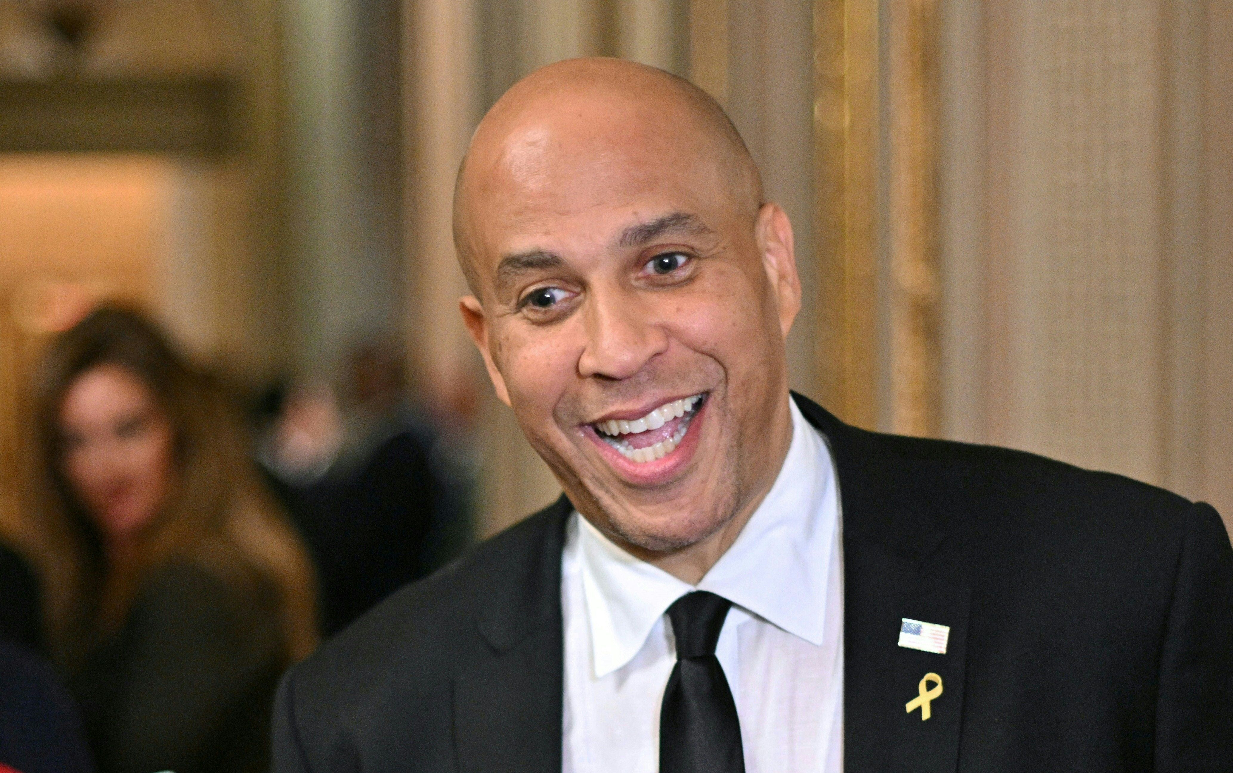 US Senator Cory Booker (D-NJ) speaks to the press at the US Capitol in Washington, DC on April 1, 2025. Democratic US lawmaker shattered a record for the longest speech in Senate history with a fiery protest against President Donald Trump's "unconstitutional" actions, beginning late March 31, 2025 -