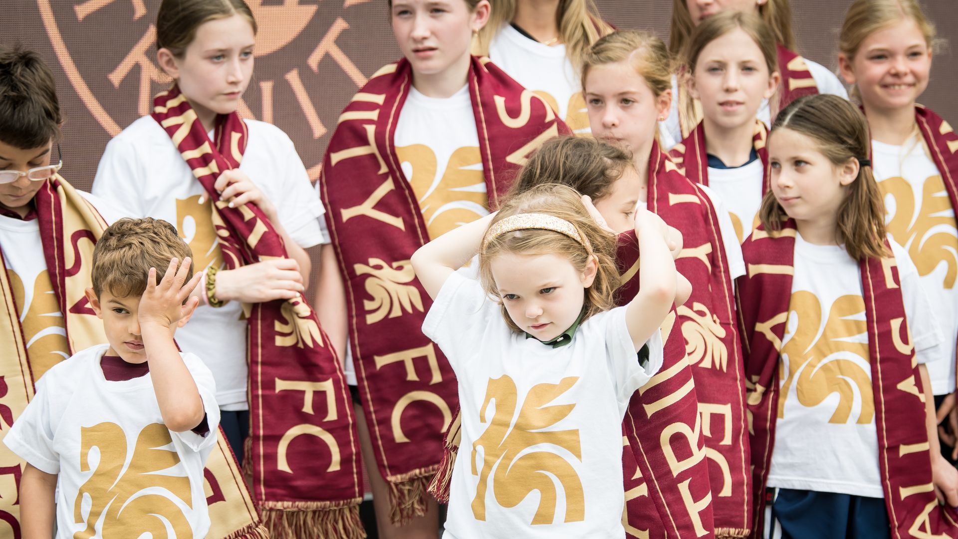 Kids wear Dallas Trinity FC gear 