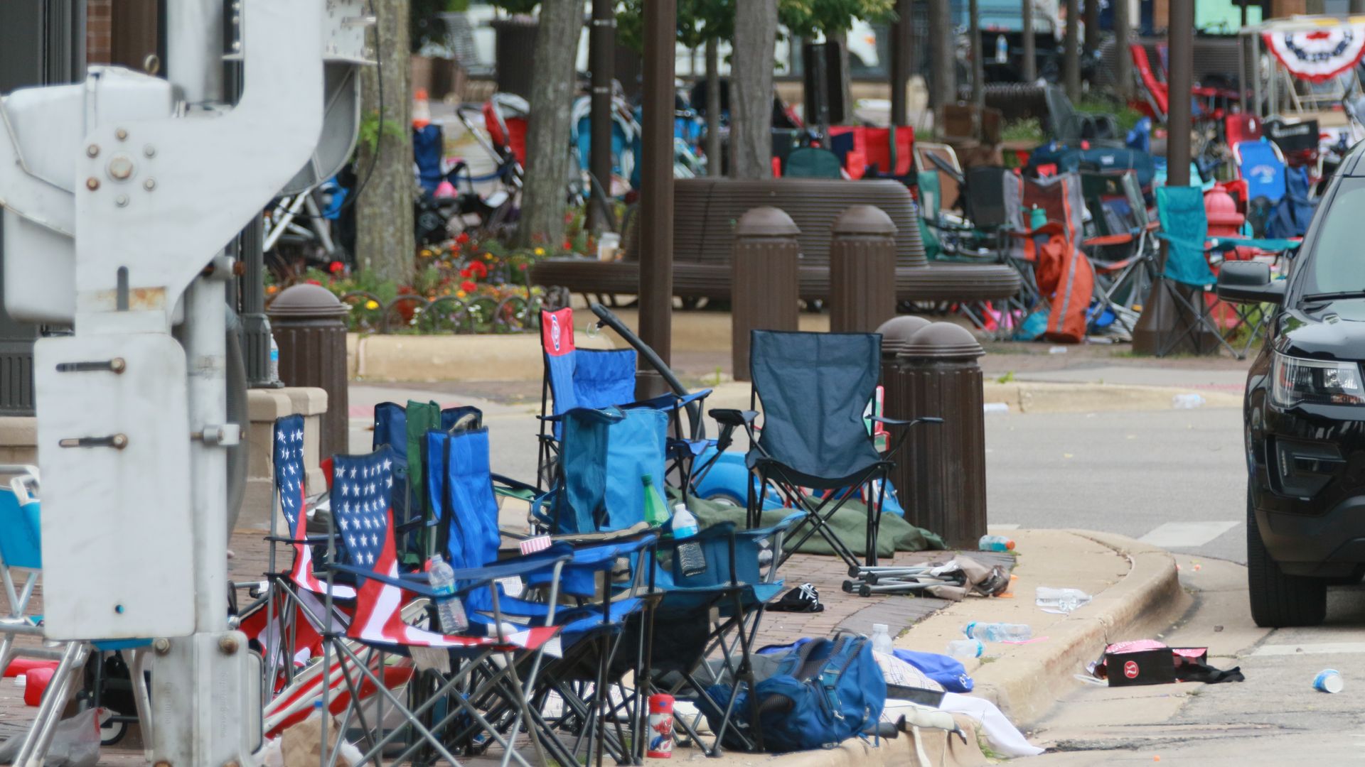  Belongings are shown left behind at the scene of a mass shooting along the route of a Fourth of July parade on July 4, 2022 in Highland Park, Illinois.