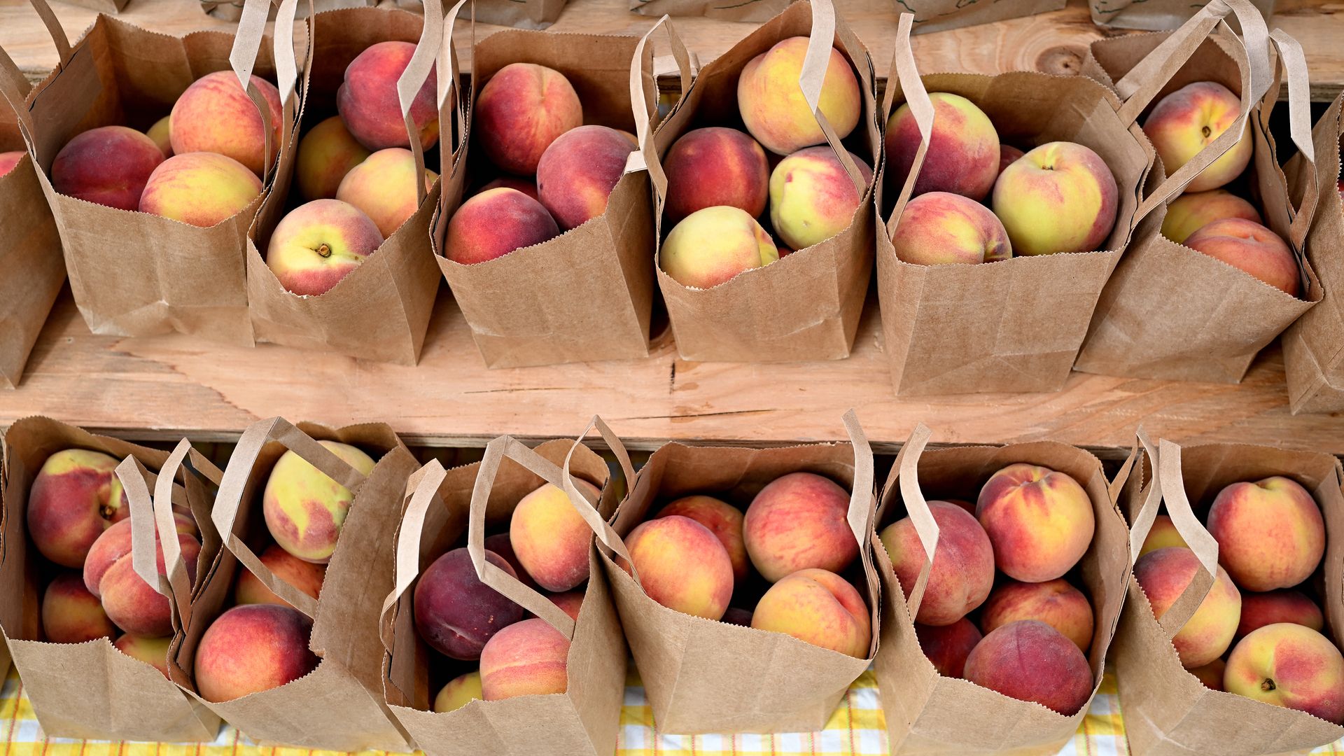 Paper bags of Palisade peaches