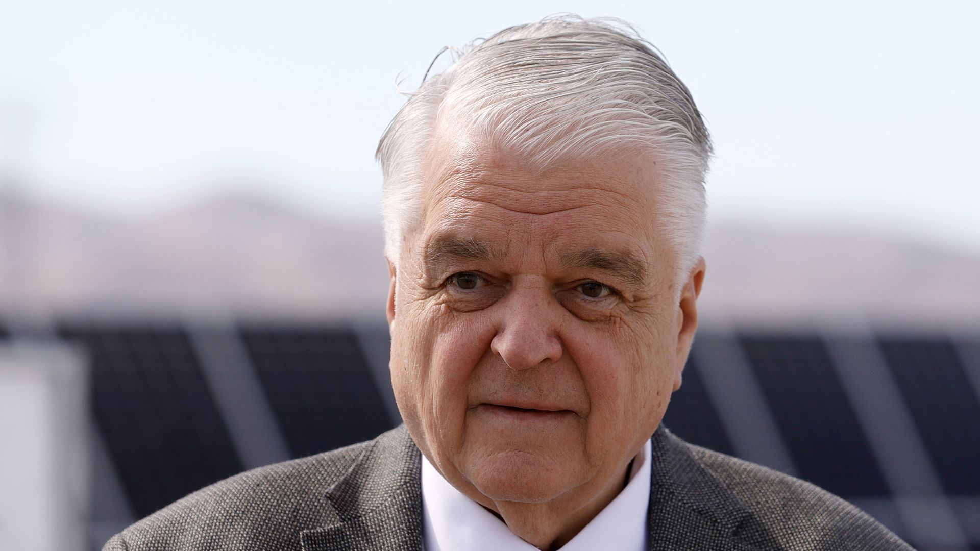 Nevada Gov. Steve Sisolak attends the launch of the 100-megawatt MGM Resorts Mega Solar Array on June 28, 2021 in Dry Lake Valley, Nevada.