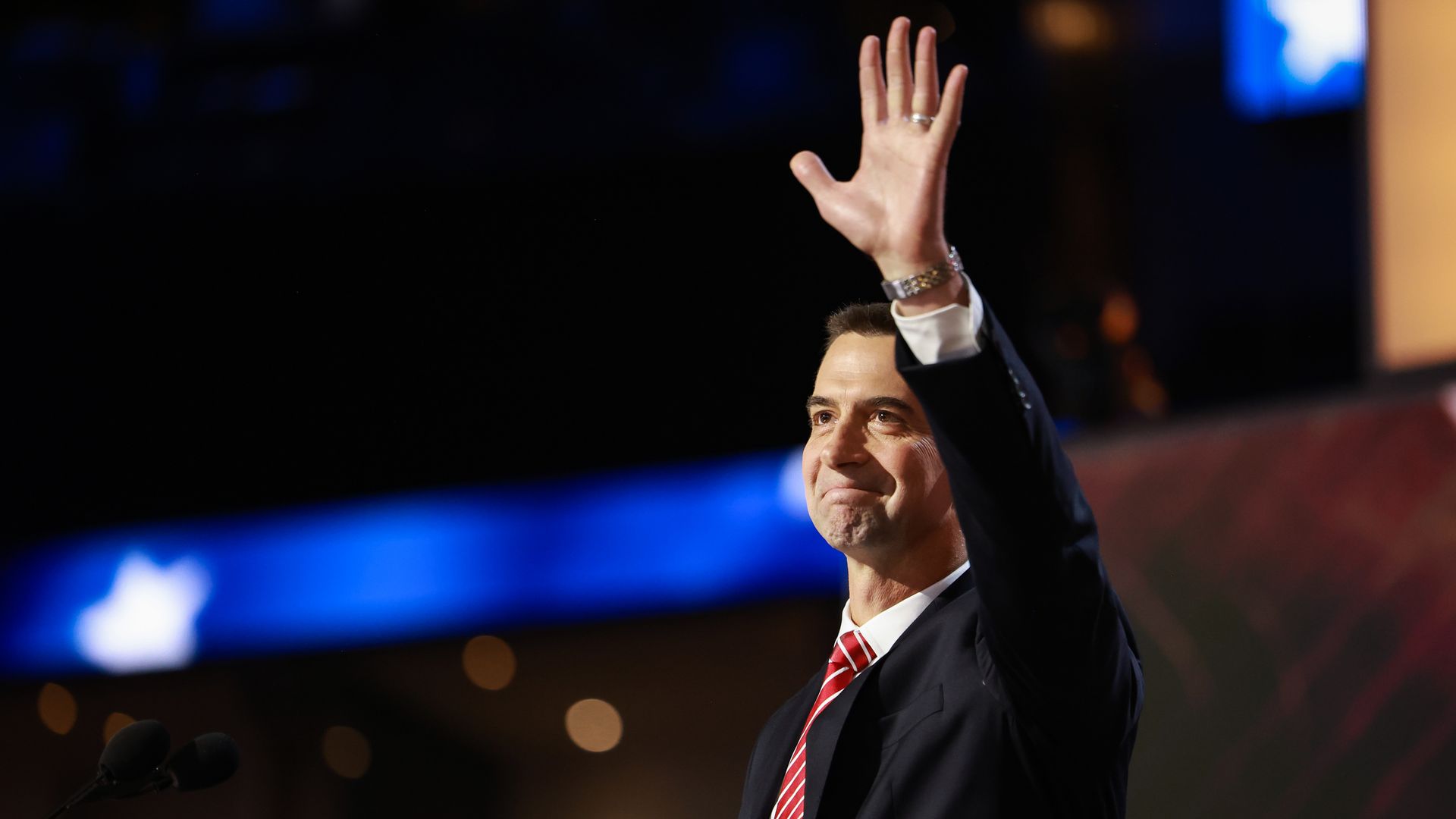 Sen. Tom Cotton (R-AR) waves to the crowd while speaking on stage on the second day of the Republican National Convention