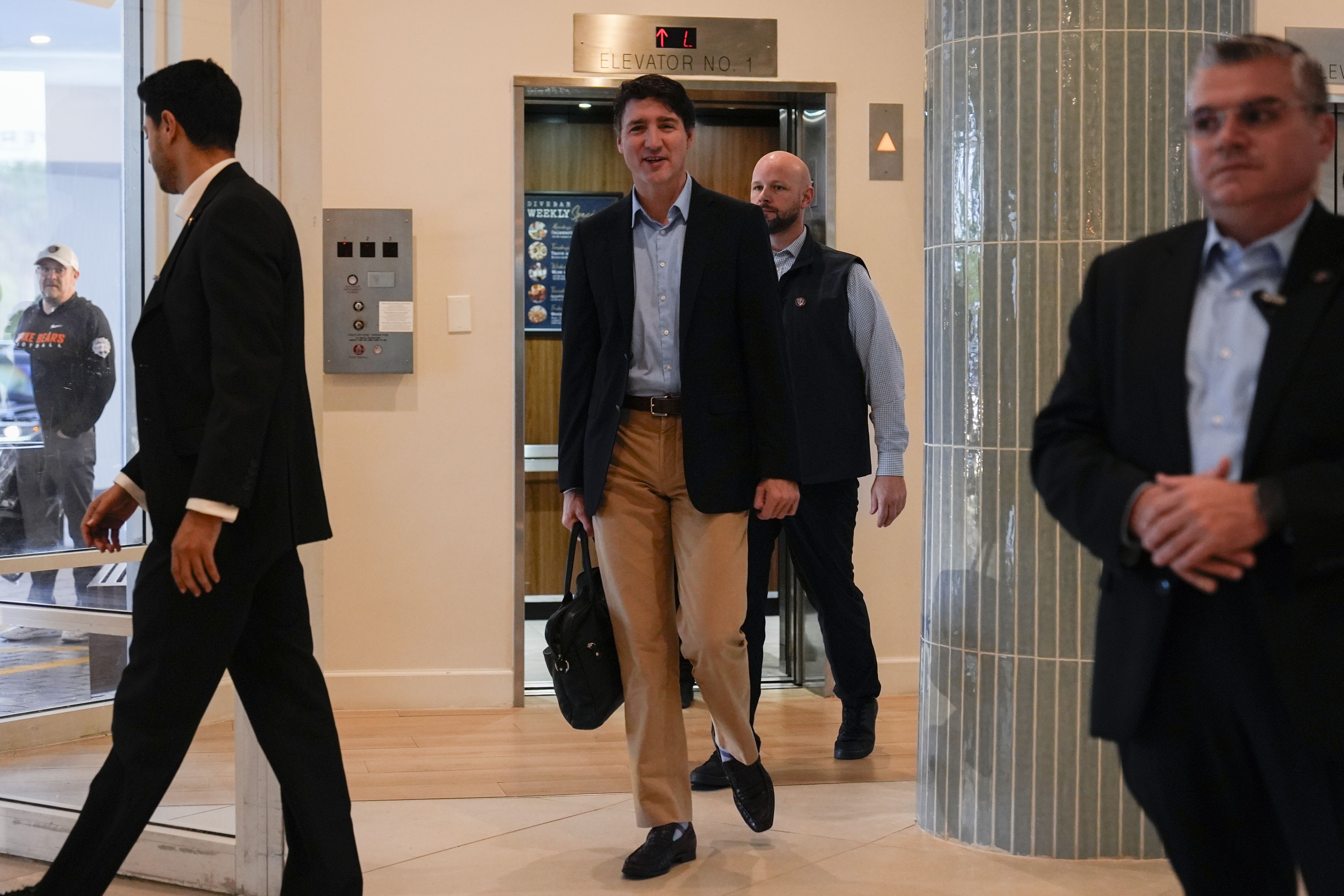 Trudeau walks into a lobby