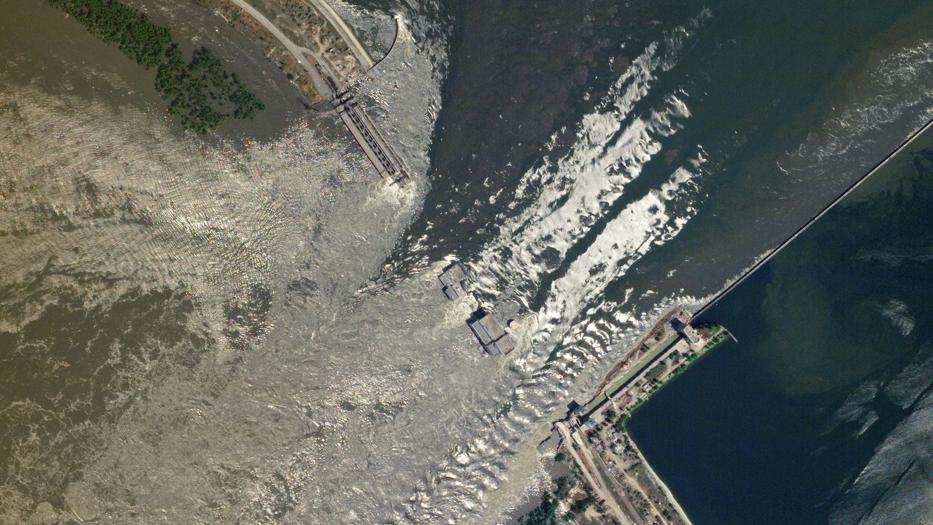 Satellite view of damage to the Kakhovka dam in southern Ukraine today. Photo: Planet Labs via AP