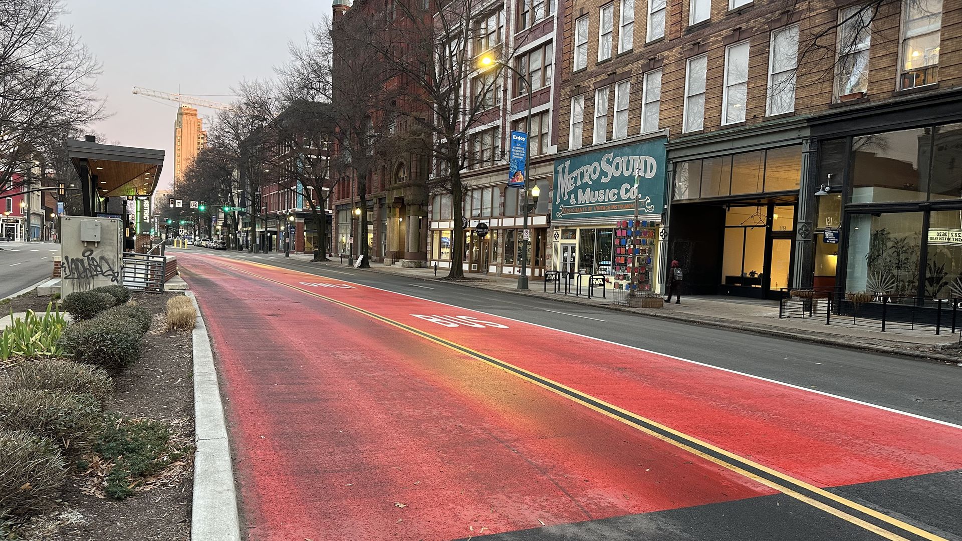 a big red bus lane in downtown