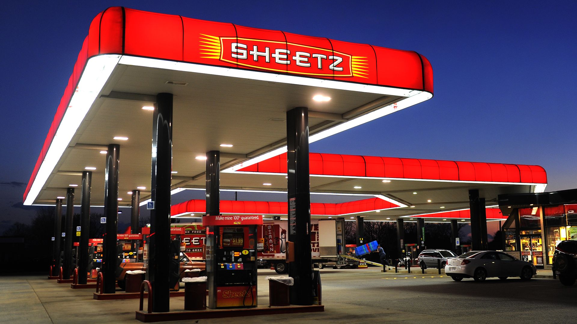 The Sheetz gas and food store can be seen for quite some distance as it glows in the dusk.
