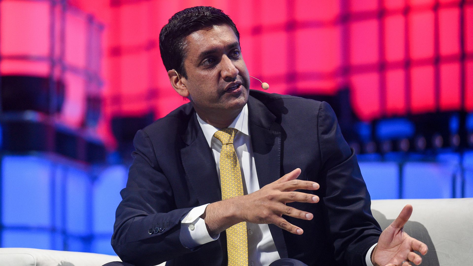 Rep. Ro Khanna is seen speaking on stage.
