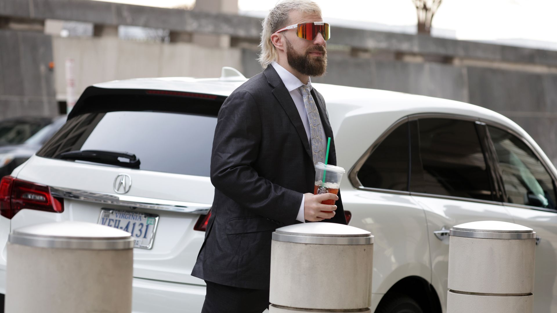 Far-right media personality Anthime Gionet, also known as "Baked Alaska," walking into a federal courthouse in Washington, D.C., on Jan. 10.