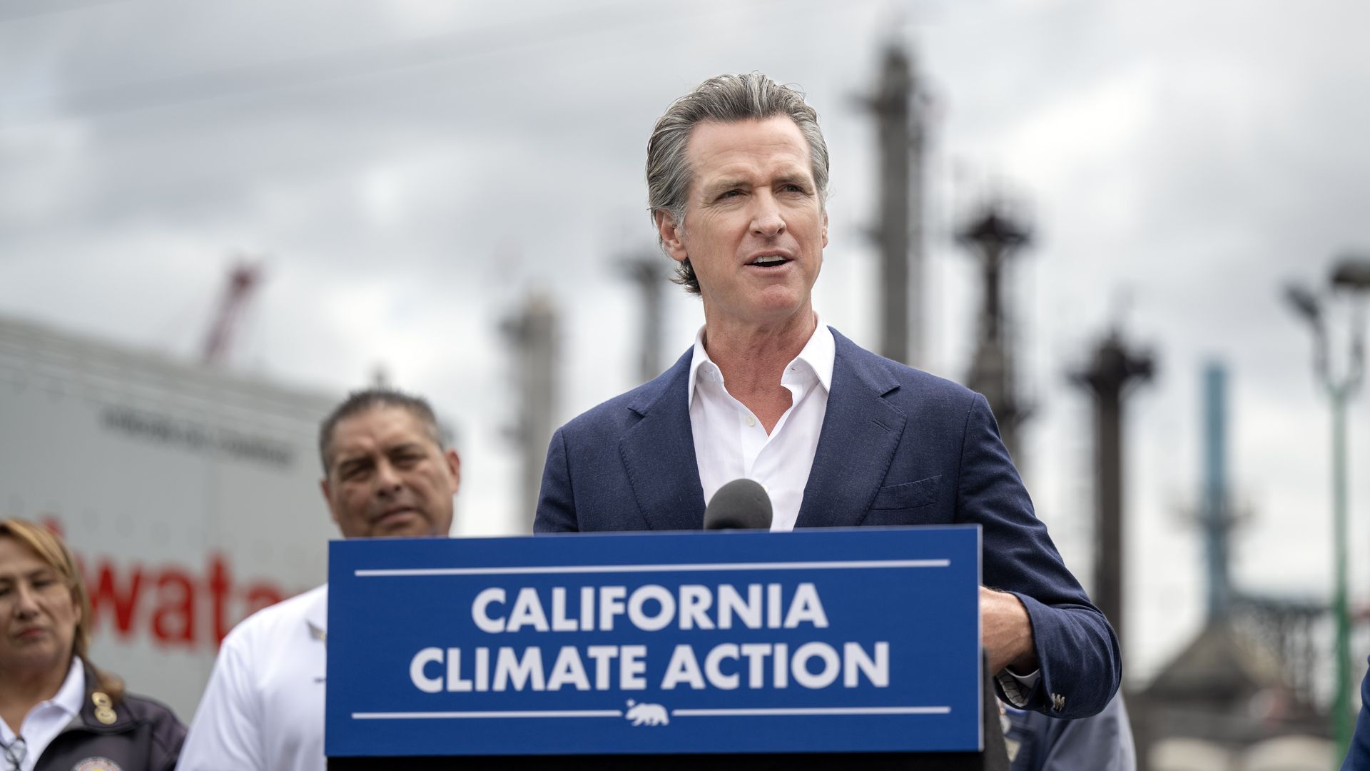 Photo of Gavin Newsom speaking from a podium 