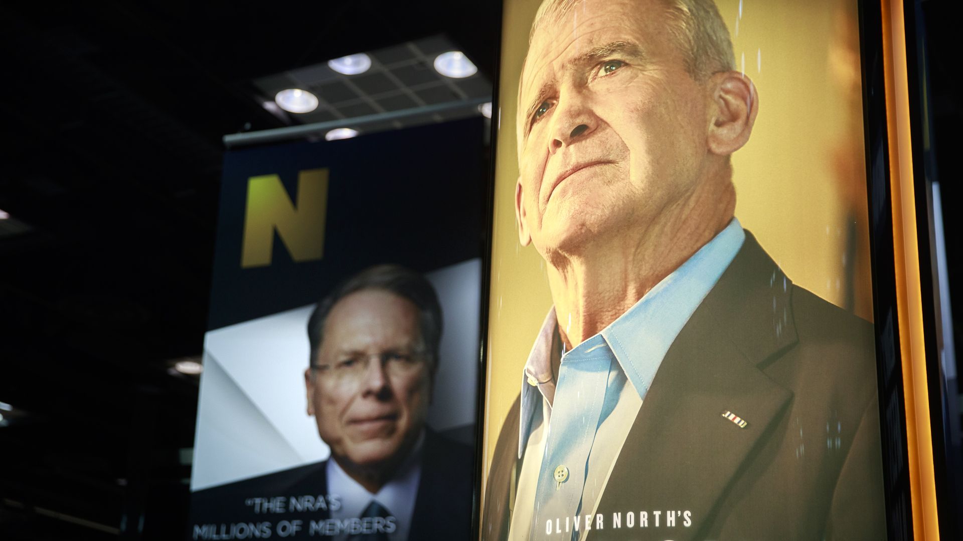Photos of NRA Chief Executive and Executive Vice President Wayne LaPierre (L) and former president of the NRA Oliver North.