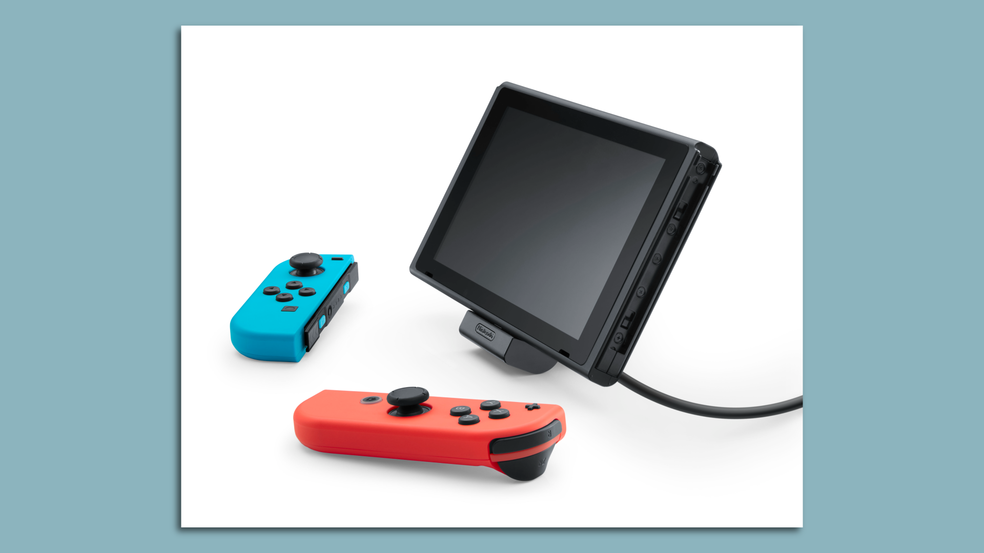 Photo of a Nintendo Switch and its two Joy-Con controllers 