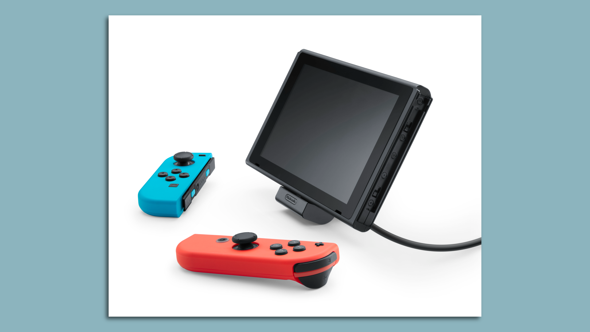 Photo of a Nintendo Switch and its two Joy-Con controllers