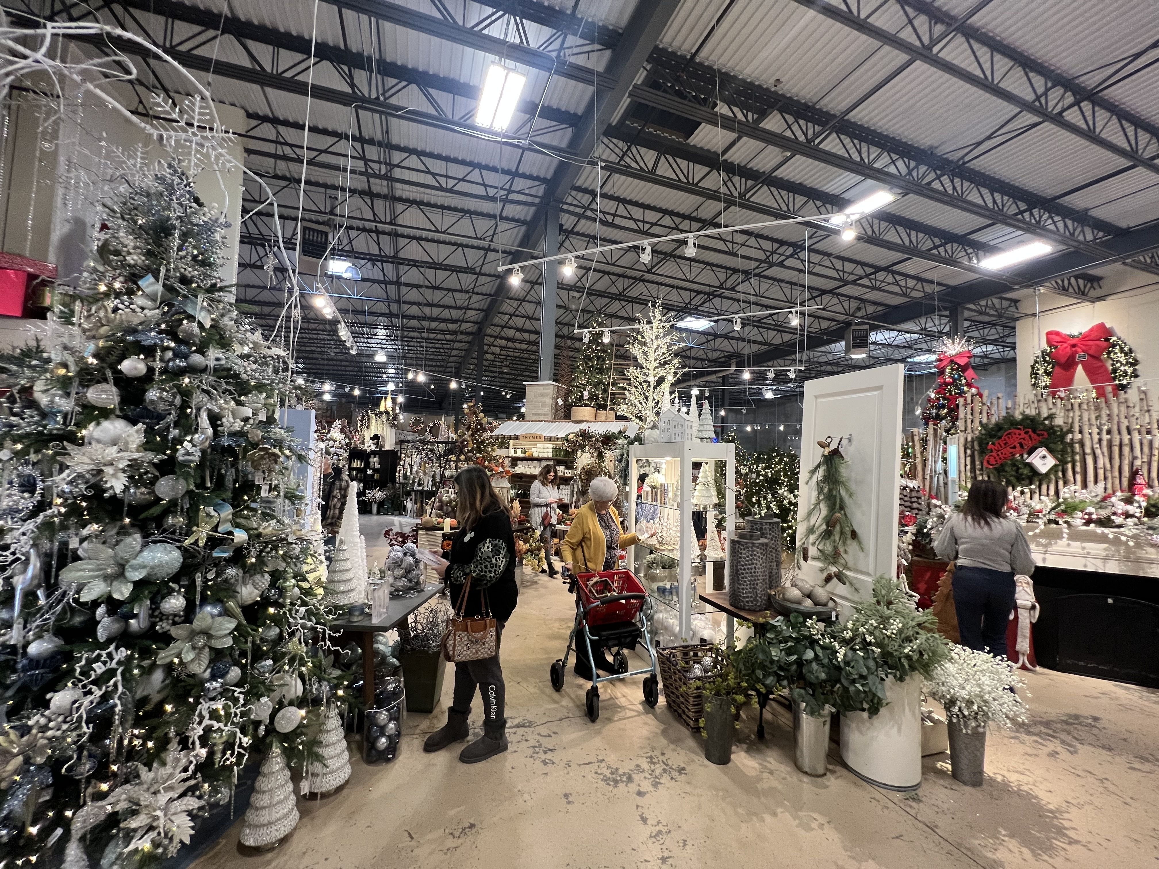 Photo of shoppers inside a Christmas decoration store 
