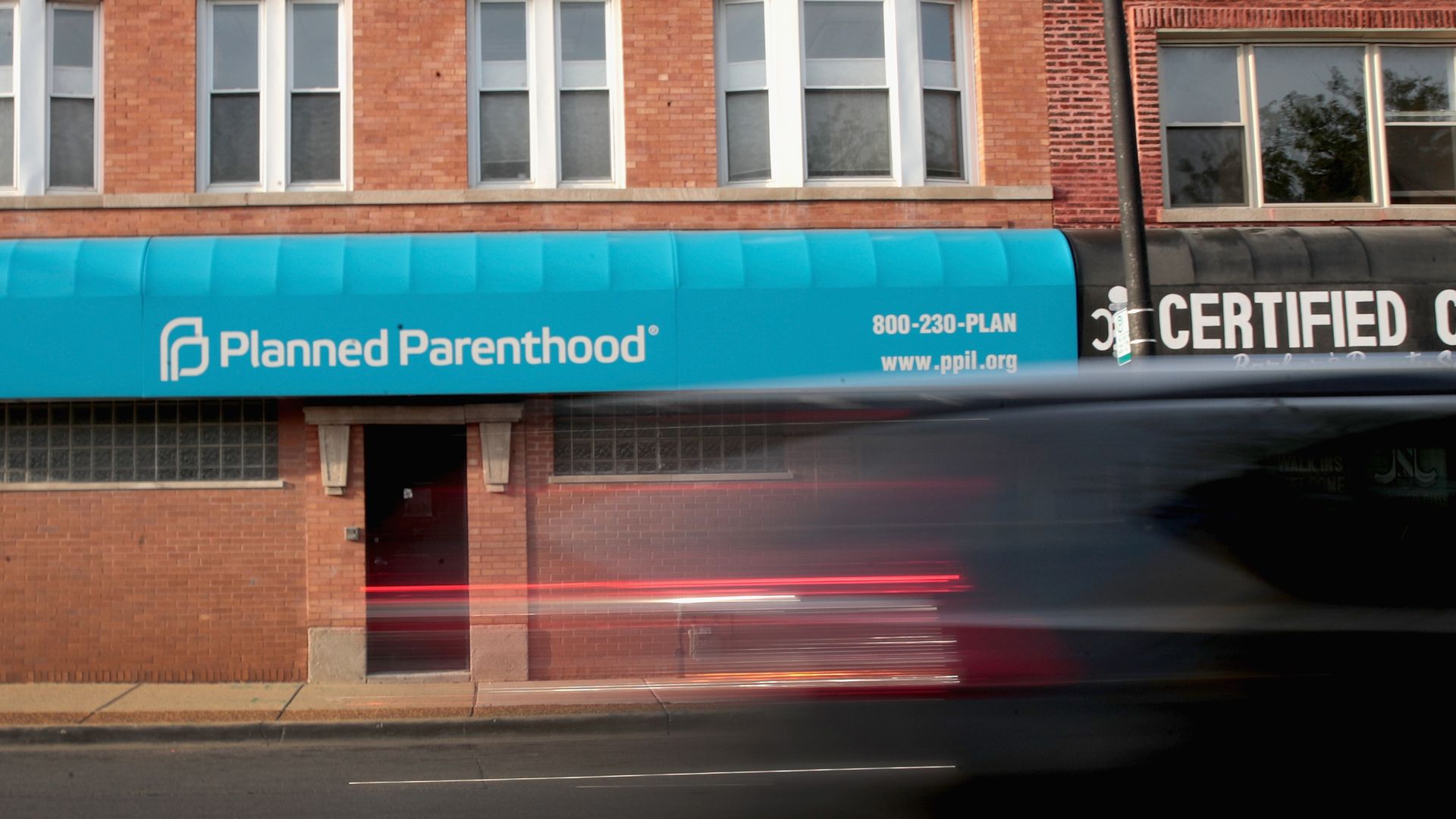 Photo of a faced of a building that says "Planned Parenthood"