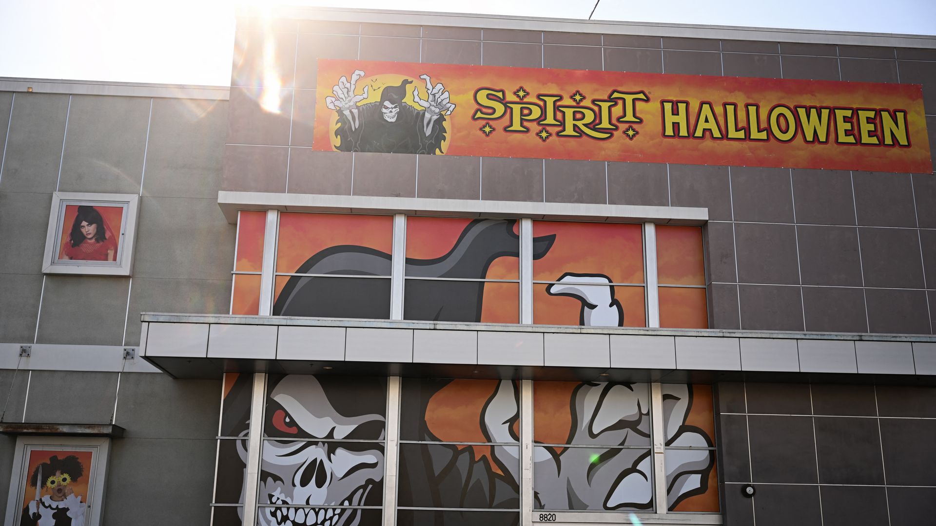The "Jack The Reaper" logo displayed in the windows of a Spirit Halloween seasonal holiday store in the location of a closed former Bed Bath and Beyond retail store.