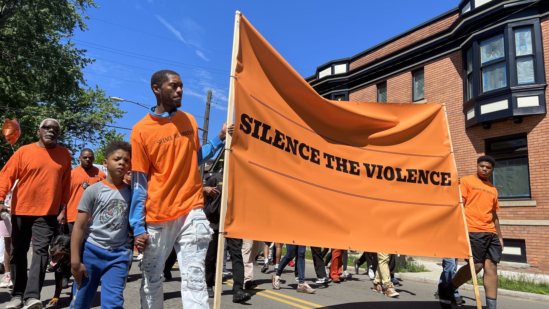 Marchers head down East Lafayette Street in Detroit to raise awareness for gun violence.