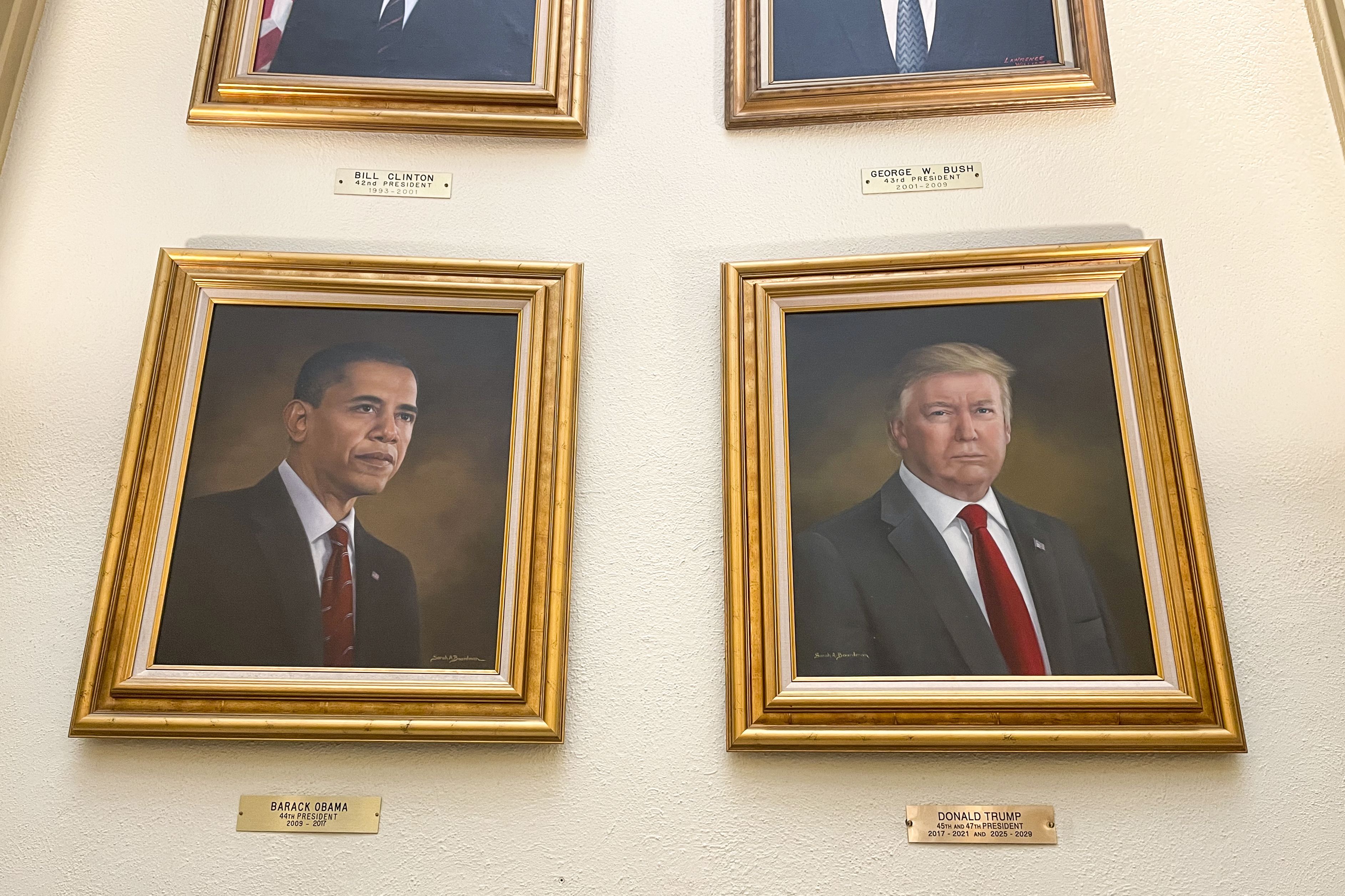 Portraits of President Donald Trump and former President Barack Obama hang in the Capitol Rotunda in Denver on Monday, March 24, 2025. (AP Photo/Jesse Bedayn)