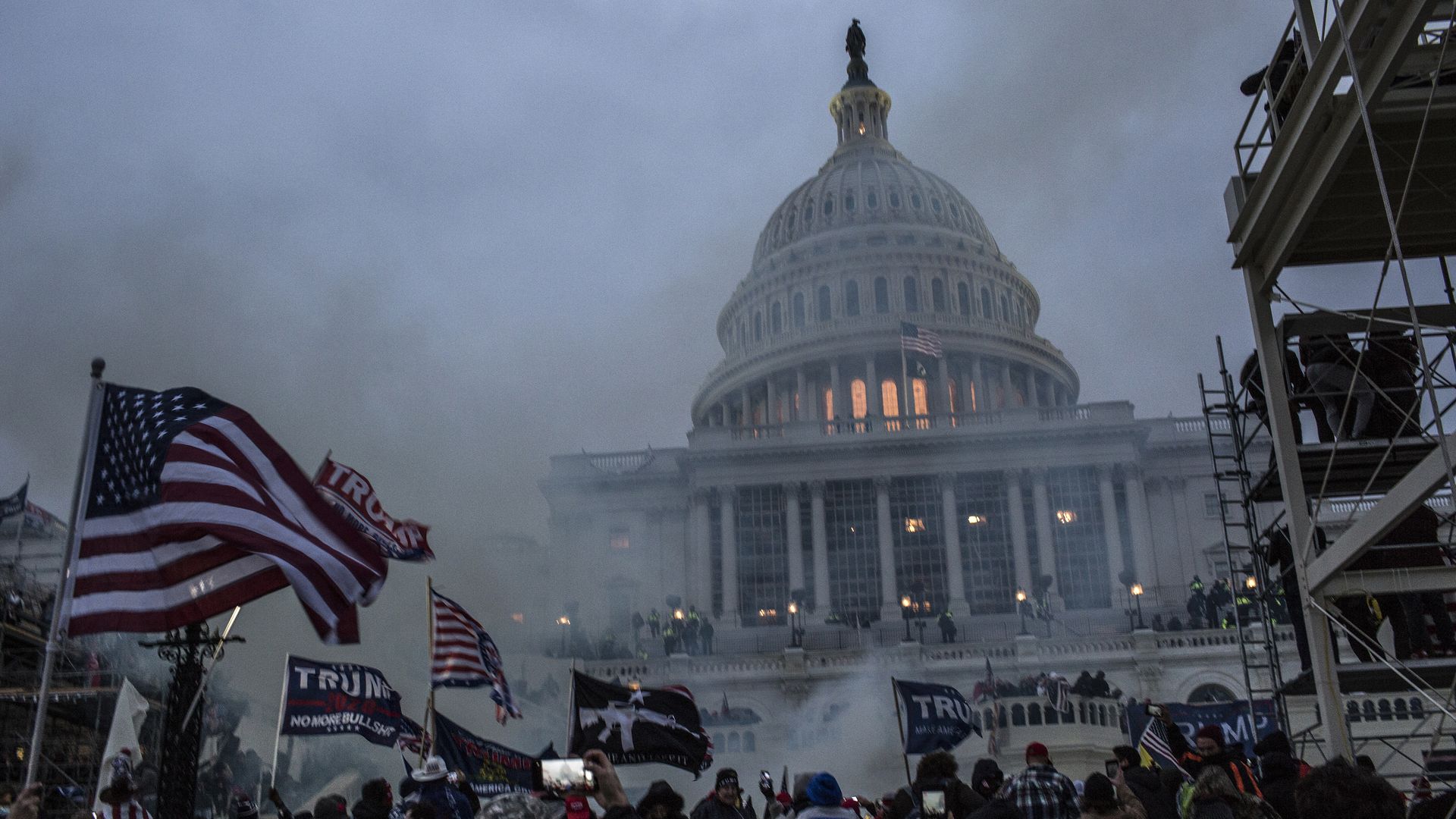 Security forces respond with tear gas after the US President Donald Trump's supporters breached the US Capitol security. 