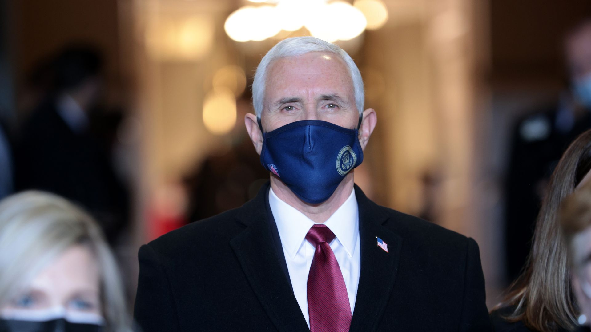 Photo of Mike Pence wearing a face mask
