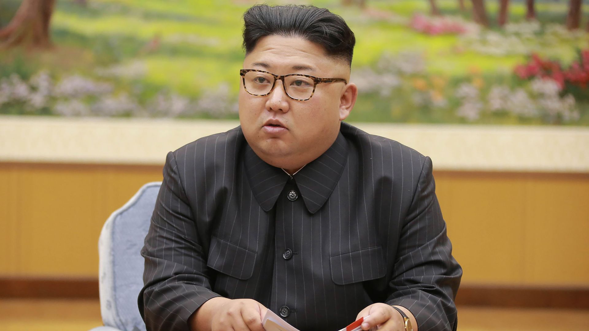 North Korean leader Kim Jong-Un attending a meeting with a committee of the Workers' Party of Korea.