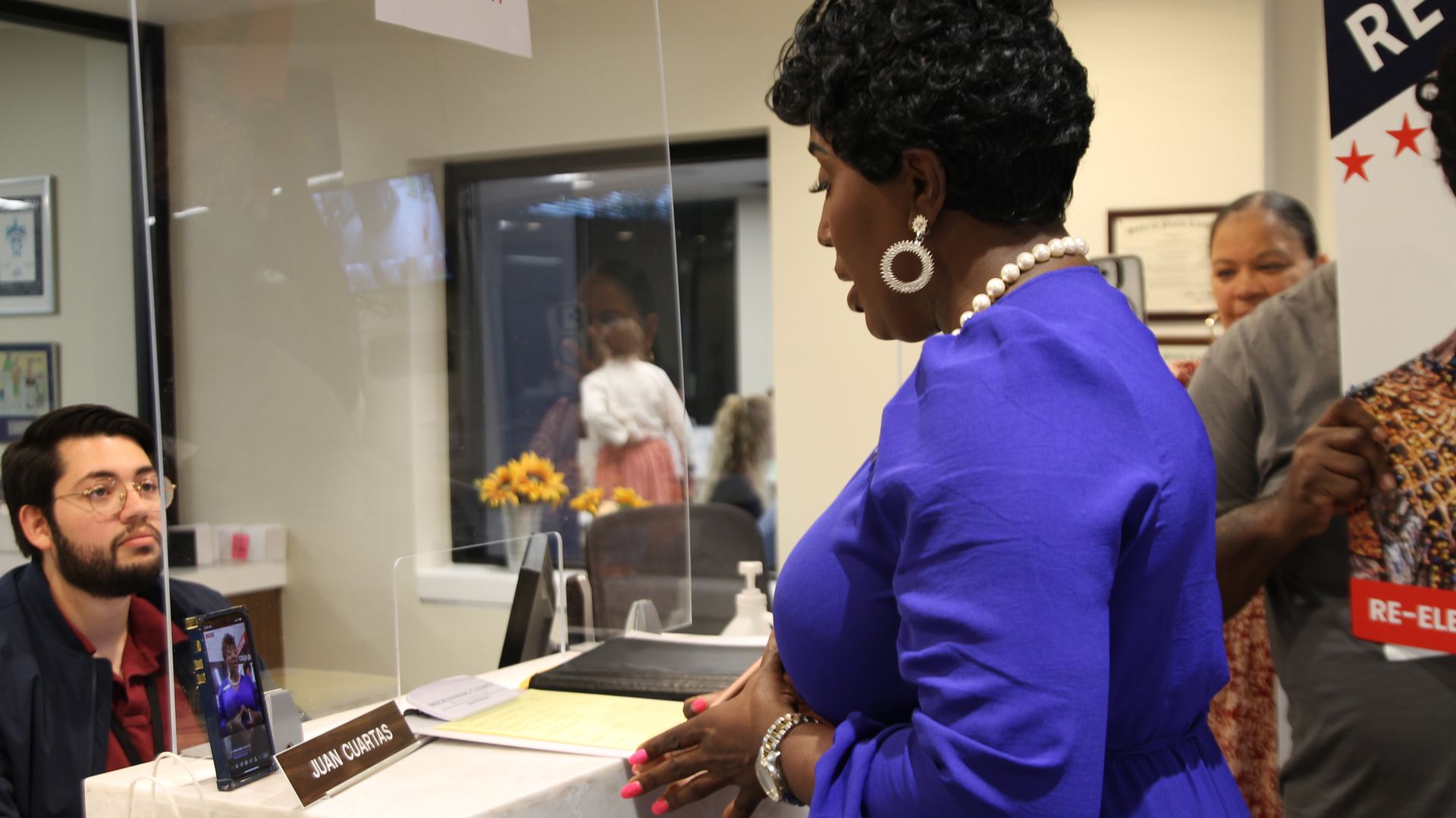 Brown films a video on her iPhone as she files for reelection