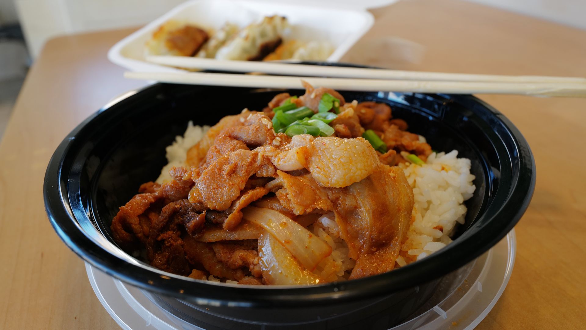 The spicy pork bulgogi bowl and pork mandu dumplings from ArkanSeoul Korean Food Company.