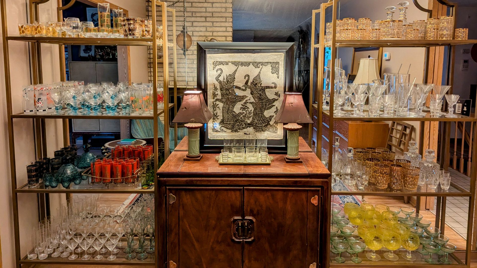 vintage barware displayed on shelving