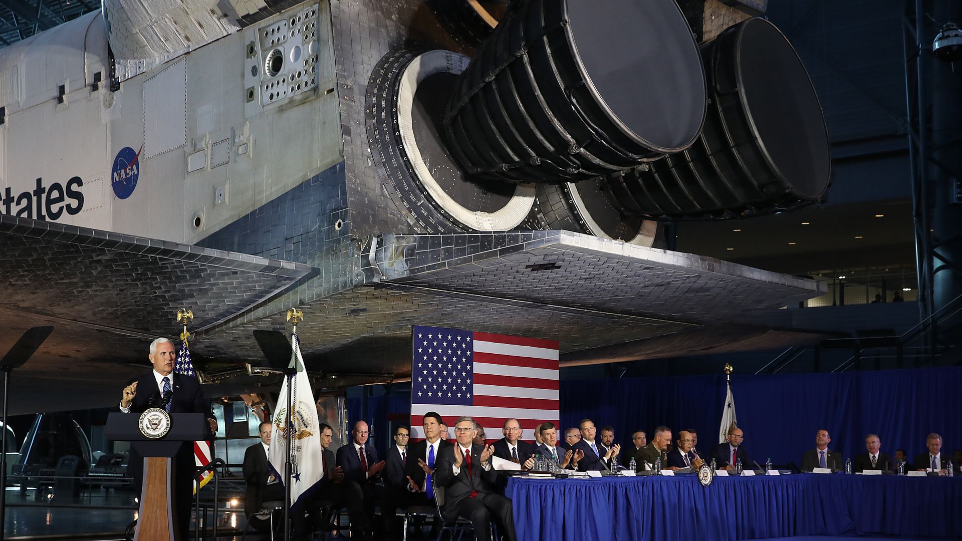 The Space Shuttle Discovery is the back drop as former Vice President Mike Pence speaks at the National Air and Space Museum, Steven F. Udvar-Hazy Center, August 20, 2019 in Chantilly, Virginia. 
