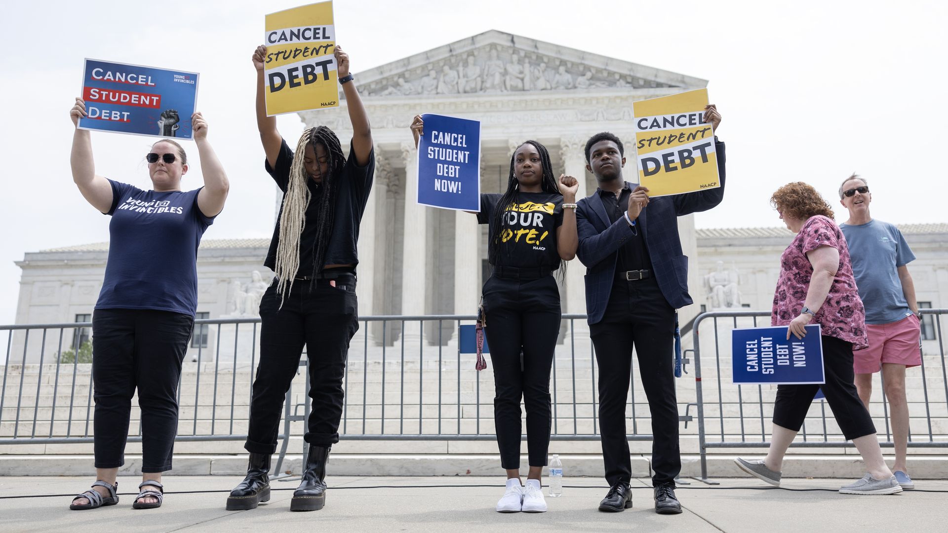 People demonstrating for student debt relief outside of the Supreme Court in June 2023.
