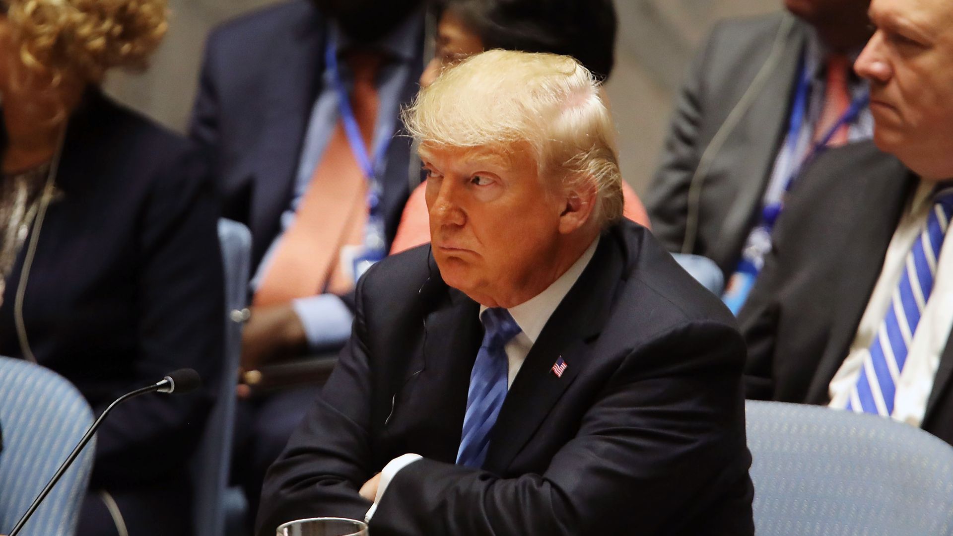 Donald Trump looks mad and suspicious, crosses arms