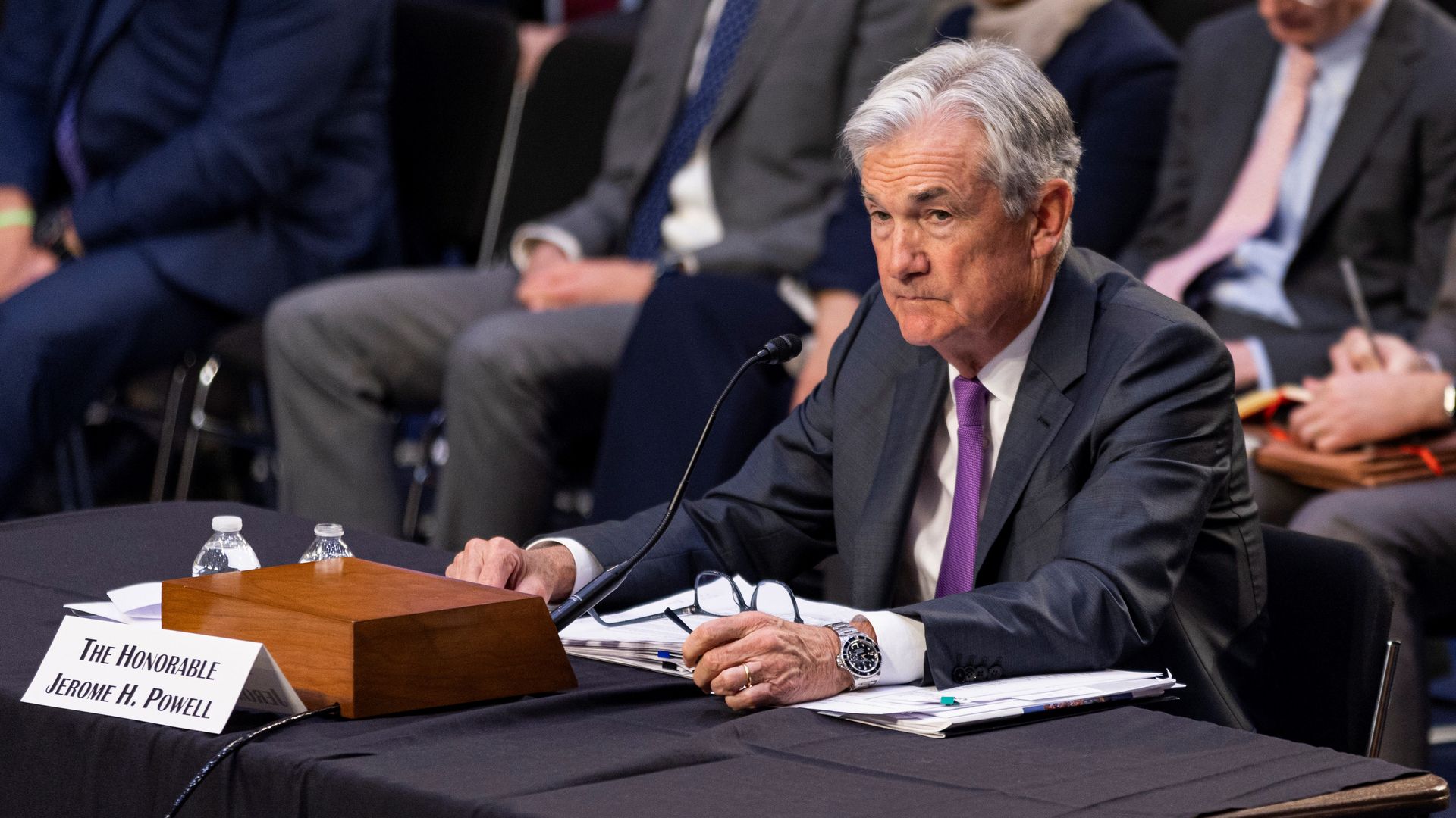 Photo of Federal Reserve chair Jerome Powell sitting at a desk at a congressional testimony