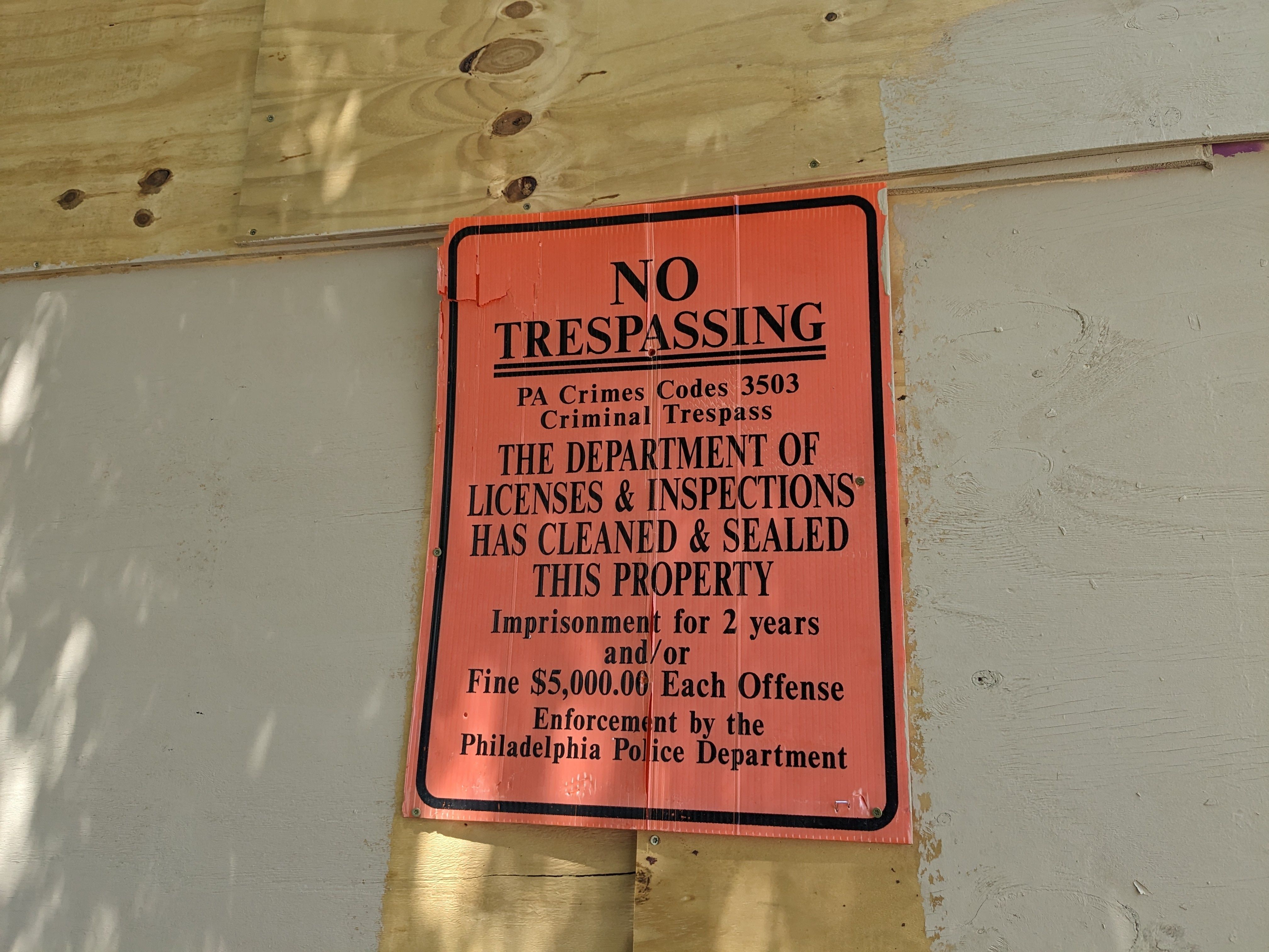 A "no trespassing" sign at the old abortion clinic. 