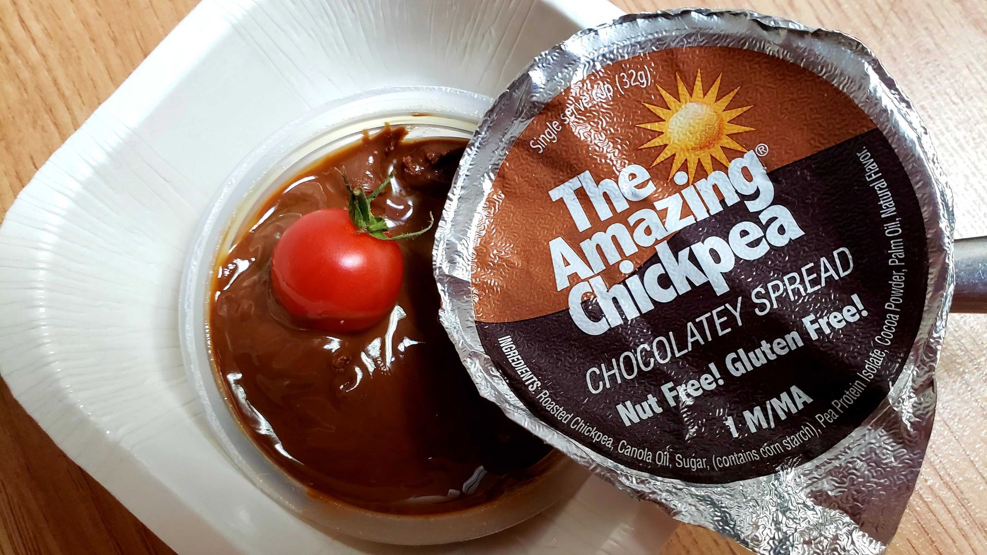 Photo of a mini pudding-like cup on a table. 