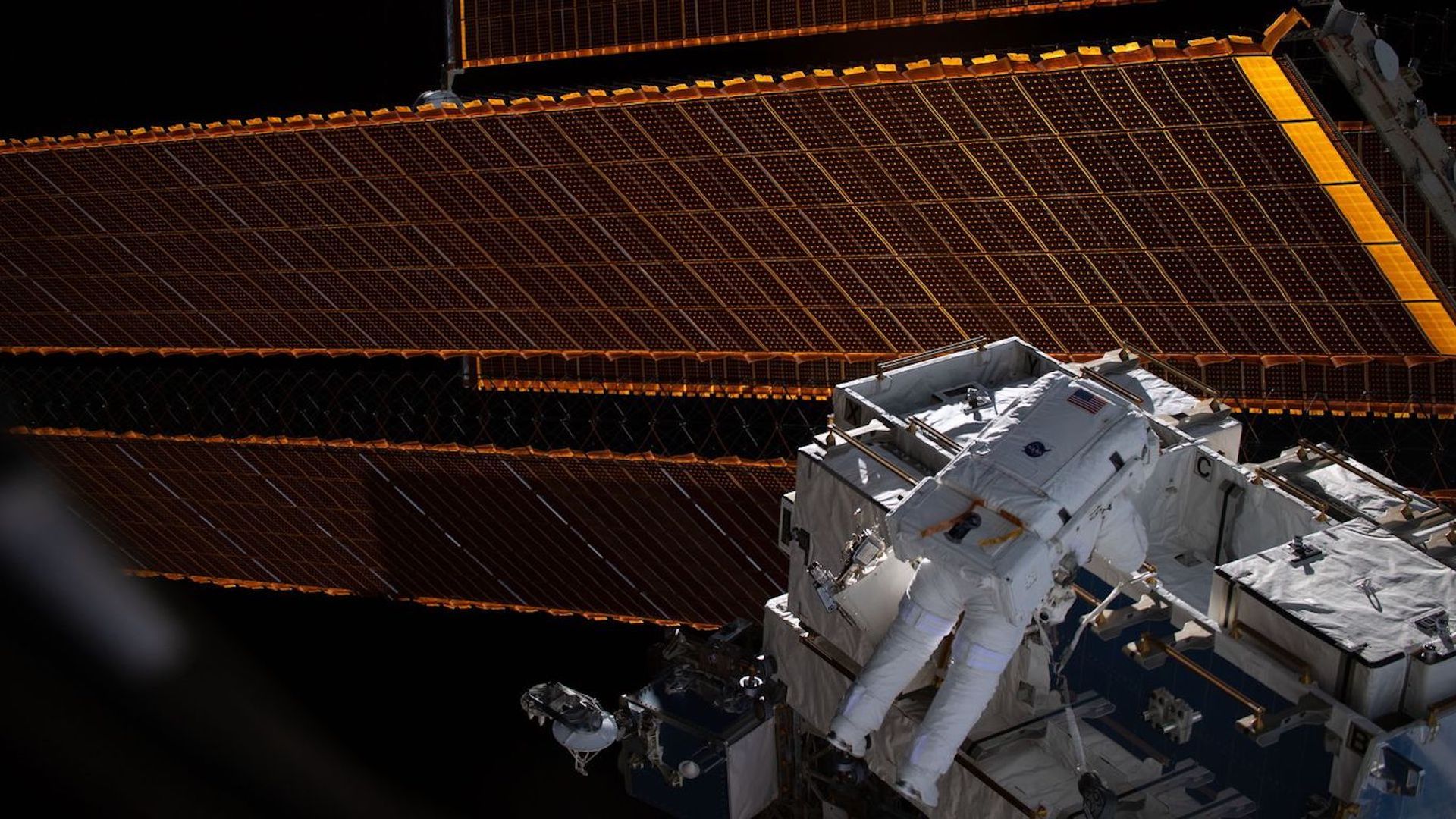 NASA astronaut Nick Hague conducts a spacewalk outside of the International Space Station.