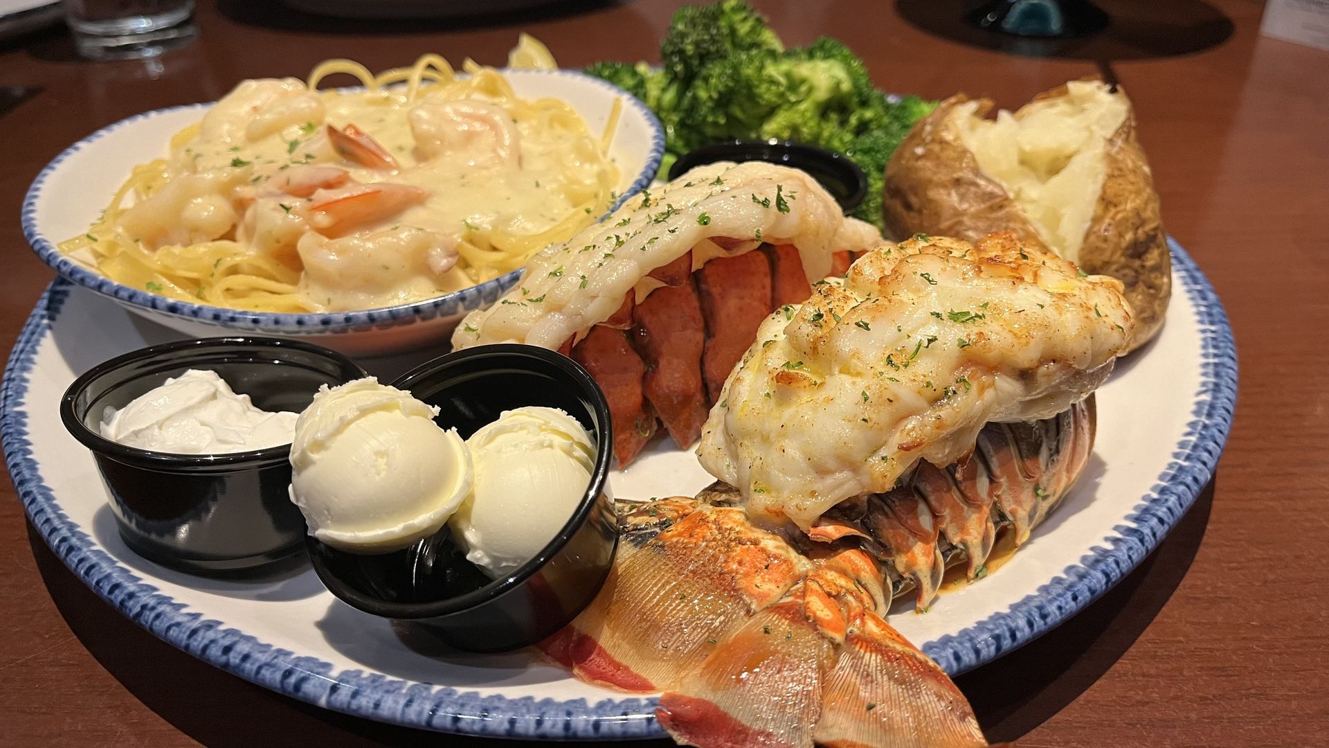 red lobster tails and noodles and butter and sour cream
