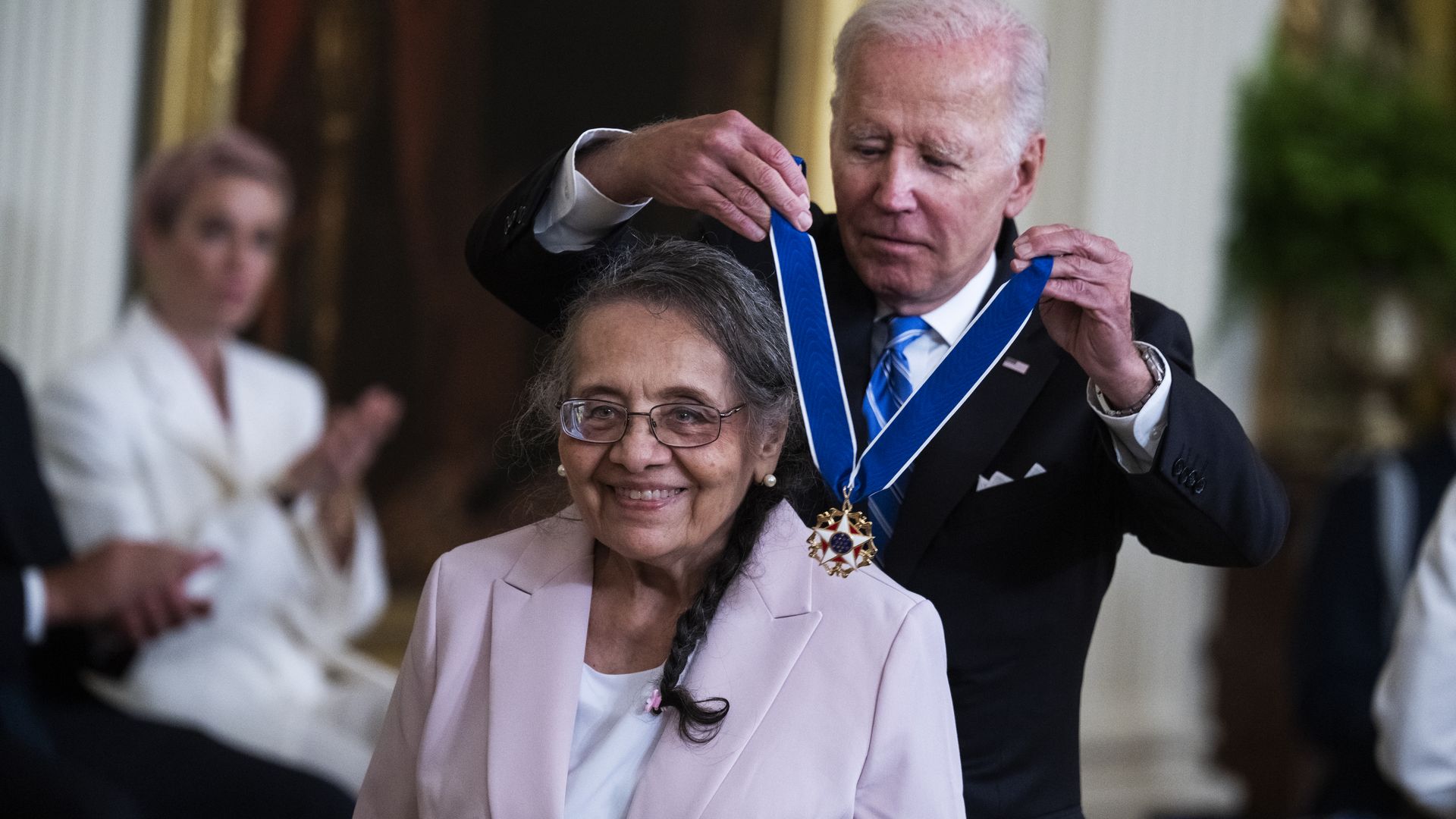 President Joe Biden presents the Presidential Medal of Freedom, the nation's highest civilian honor, to Diane Nash, a founding member of the Student Nonviolent Coordinating Committee, during a ceremony at the White House.