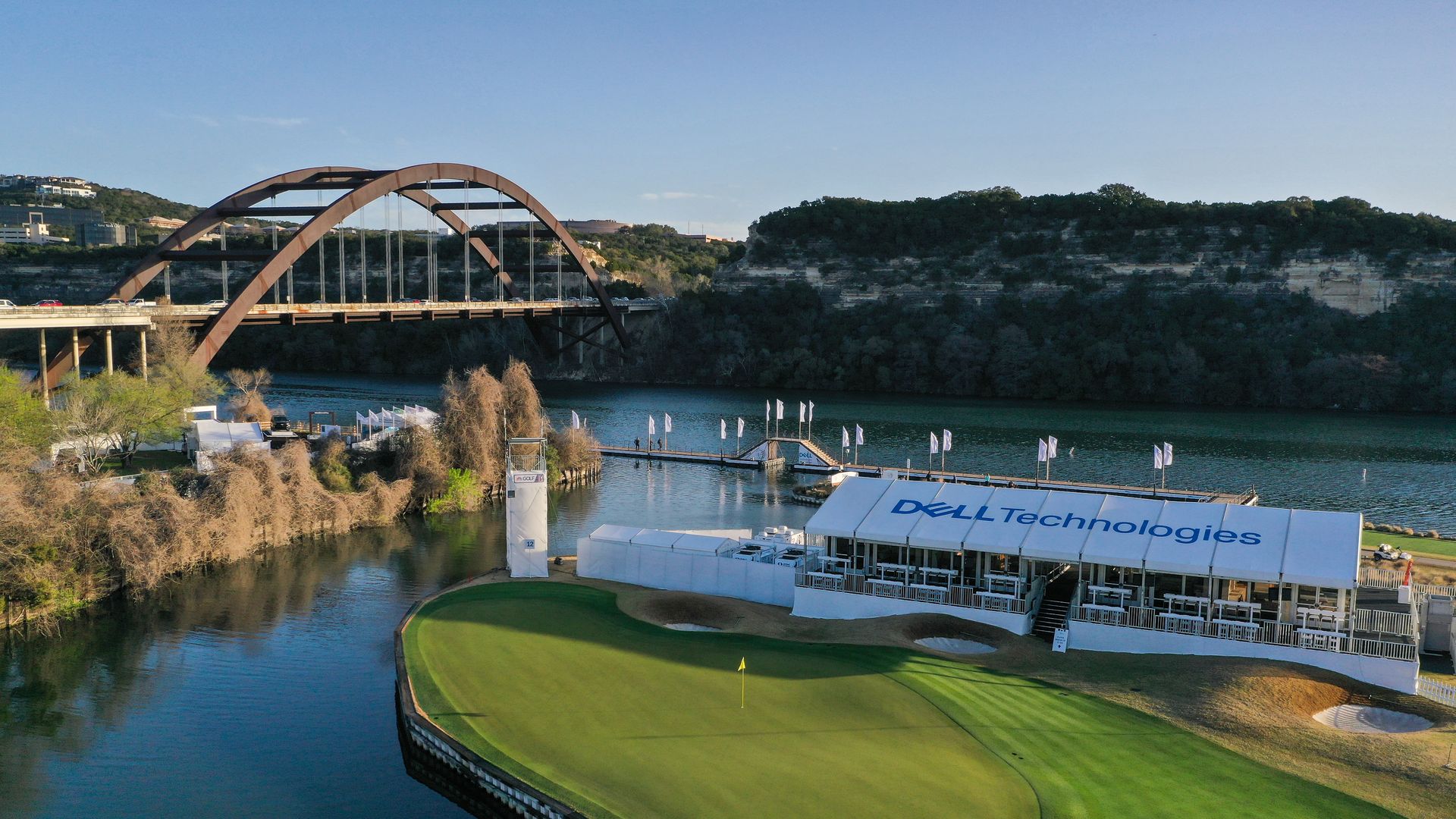 A drone photo of the 360 bridge in Austin with a tent in the foreground reading "Dell Technologies."