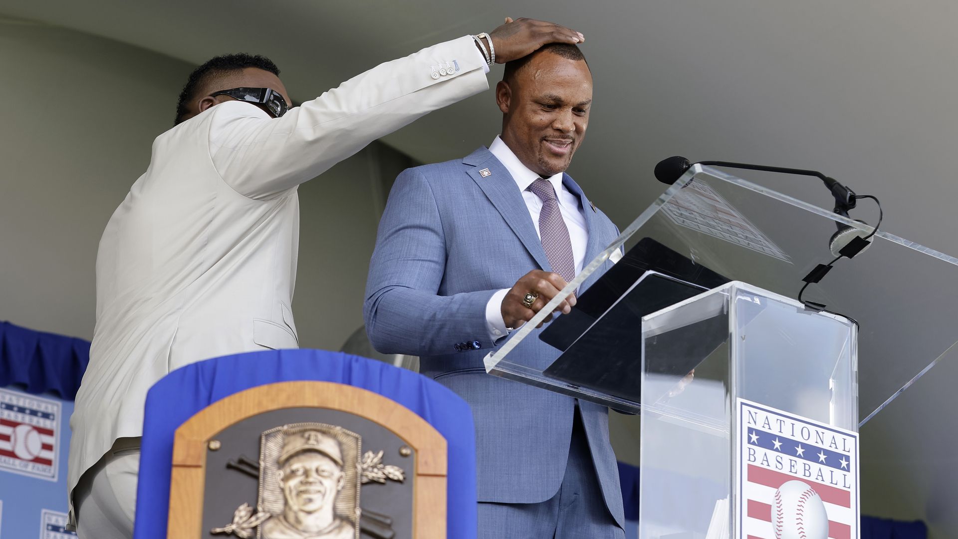 David Ortiz touches Adrian Beltre's head at the Hall of Fame induction ceremony