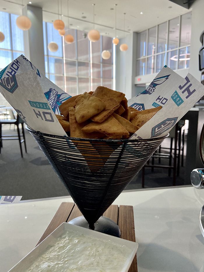 Mediterranean spreads: garlic herb hummus, tzatziki, cucumber, carrots, radishes and pita chips. Photo: Ashley Mahoney/Axios
