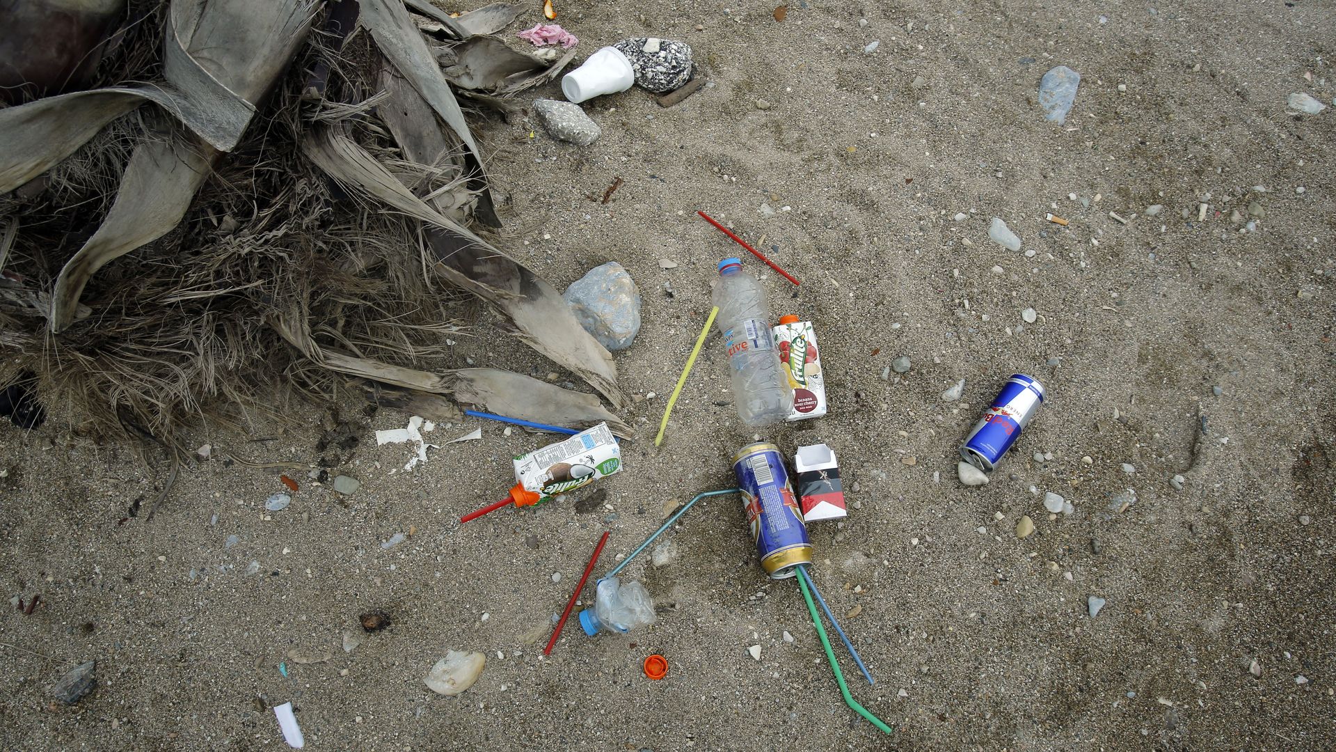 Plastic litter in sand