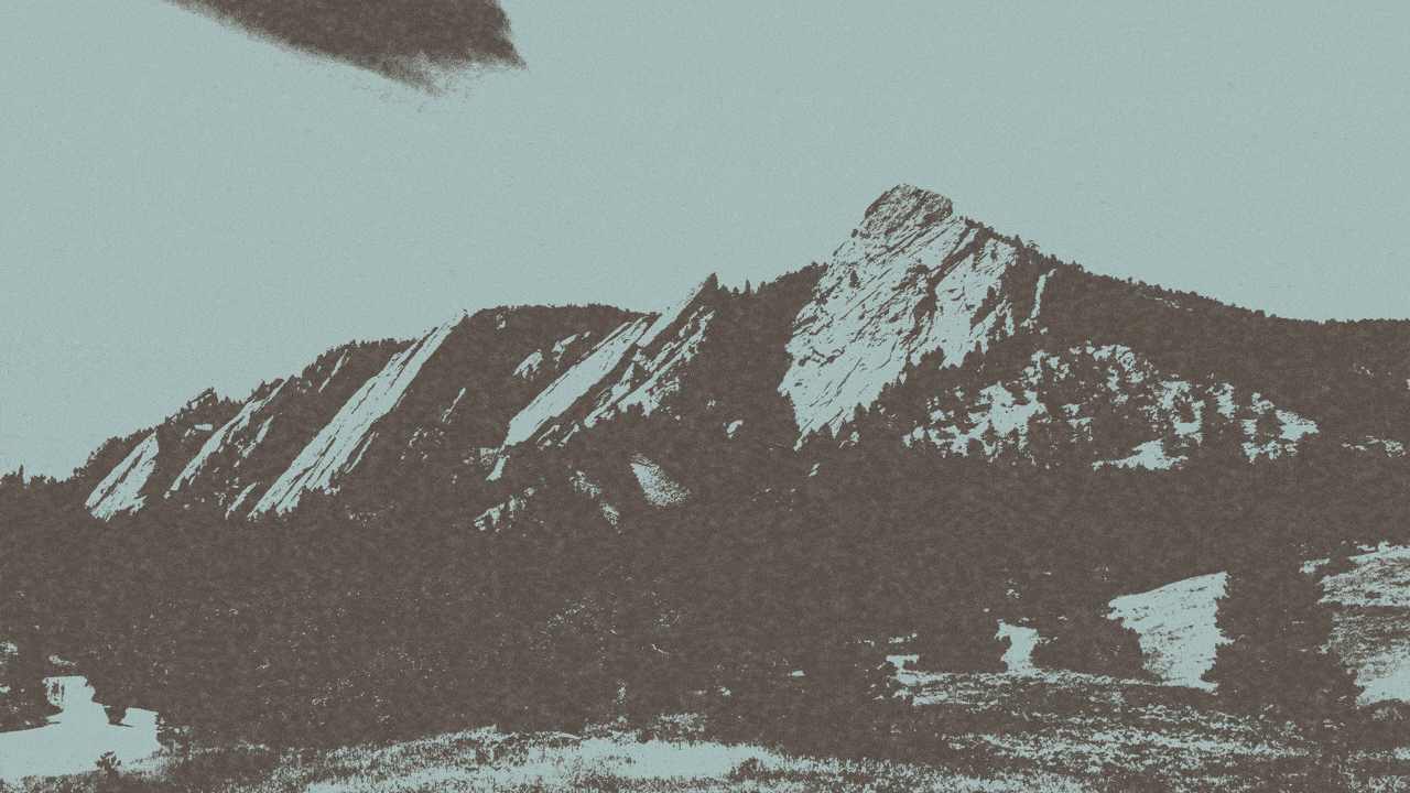Animated illustration of the Flatirons with a multicolored bubble floating by in front of them.