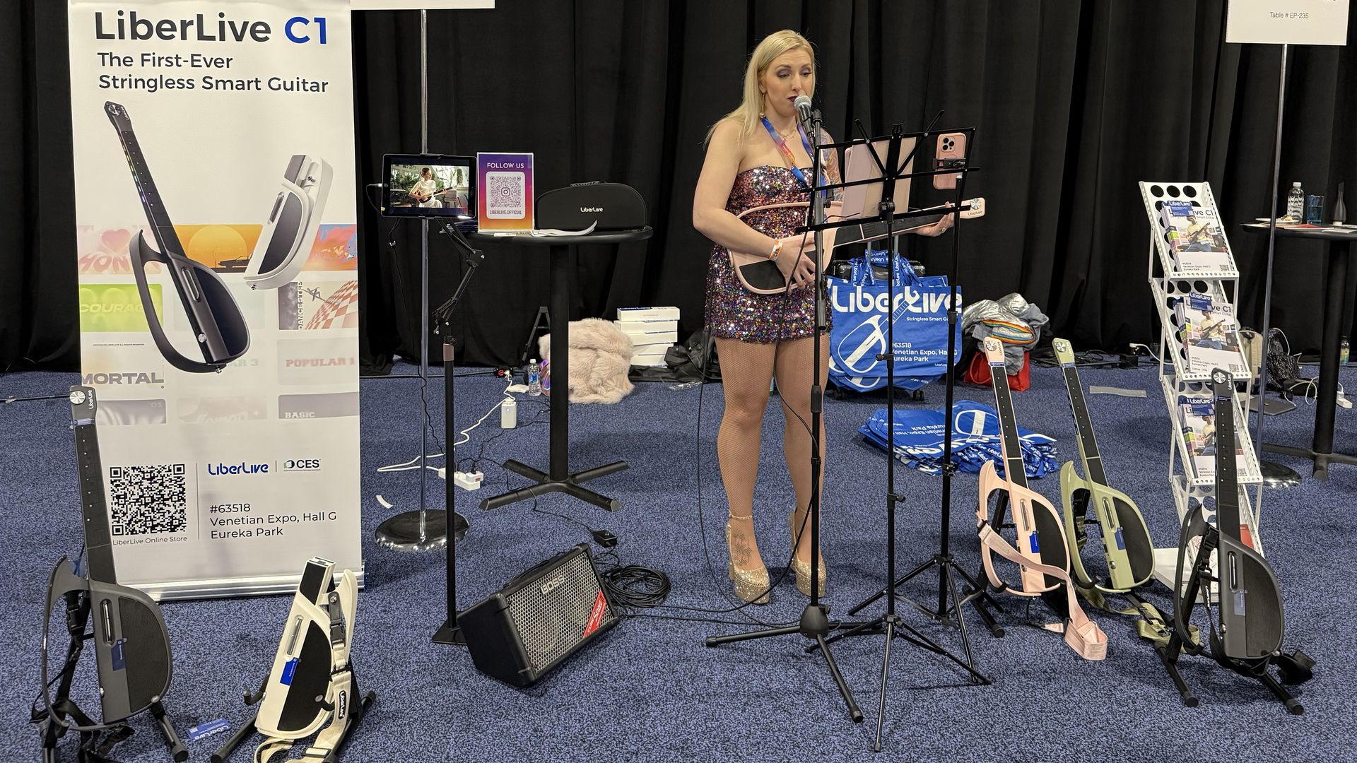 Performer at Unknown Planet Technology's booth at CES playing the LiberLive C1