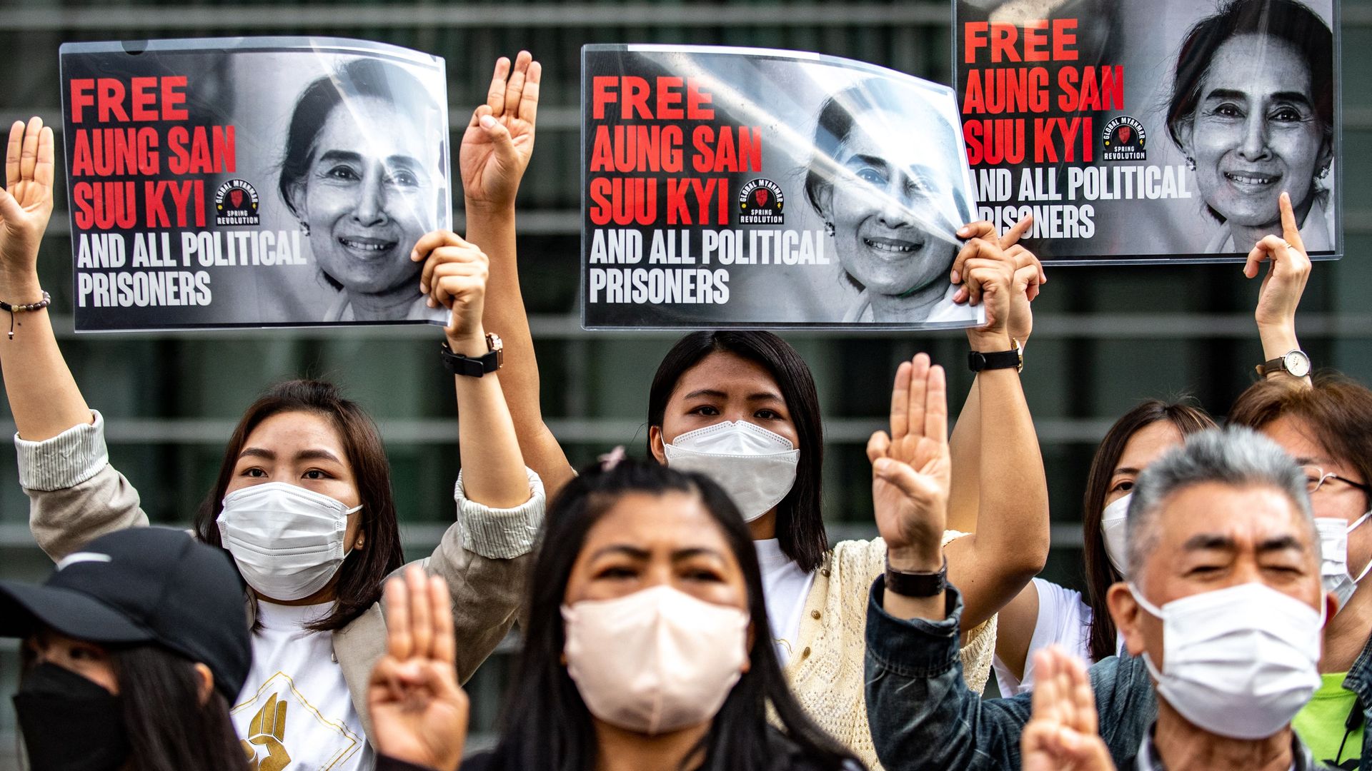 A group of Myanmar activists hold up placards calling for the release of their ousted leader Aung San Suu Kyiin Tokyo on May 22.