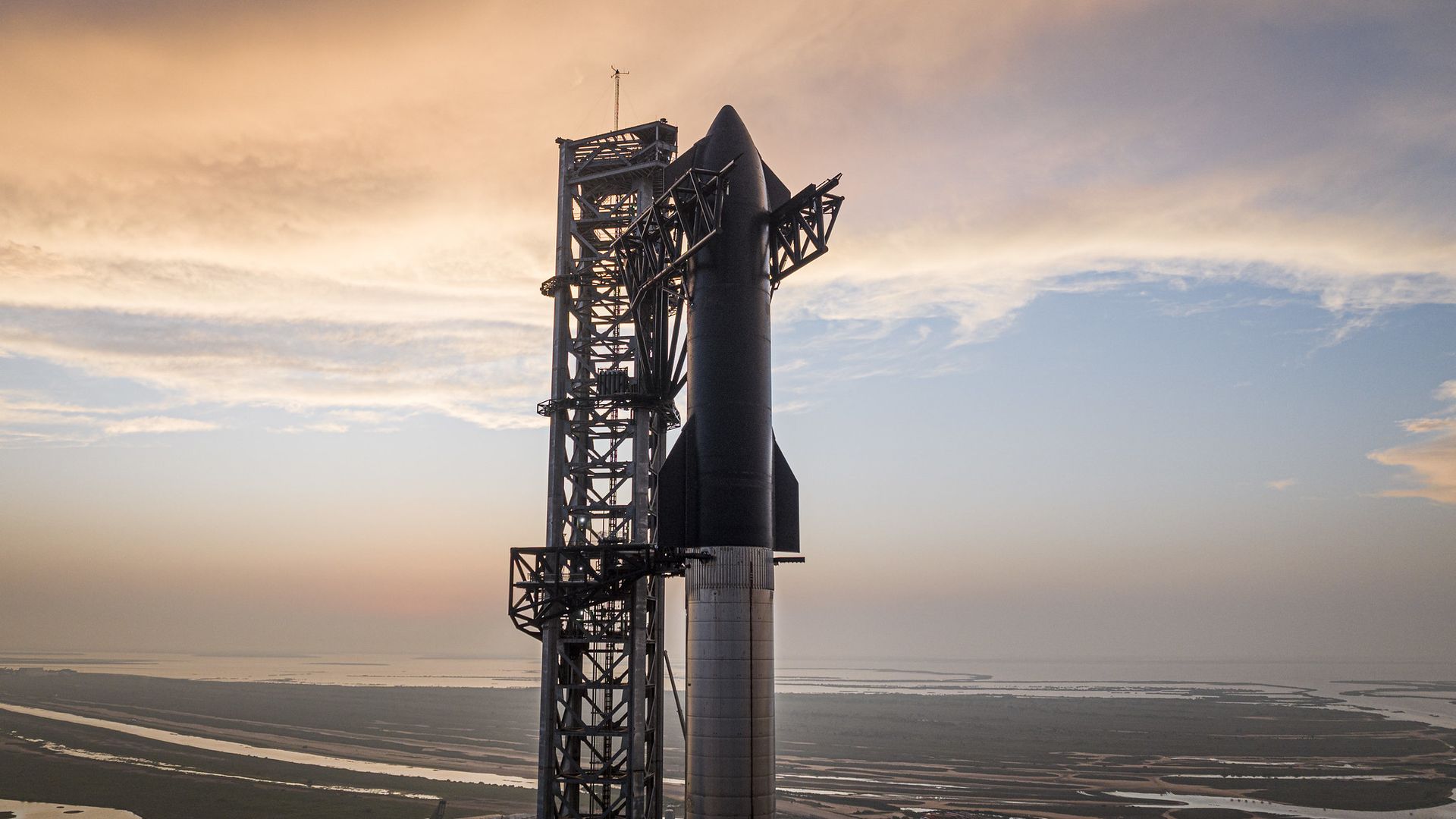 A SpaceX Starship stands on the launch pad in Texas.