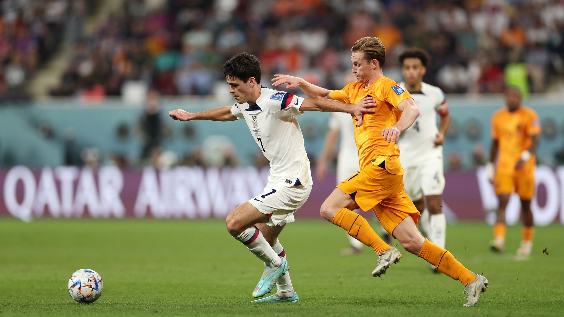 Giovanni Reyna of United States controls the ball against Frenkie de Jong of Netherlands during the FIFA World Cup Qatar 2022