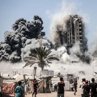 Israel bombs high-rise buildings in Gaza City ahead of massive offensive